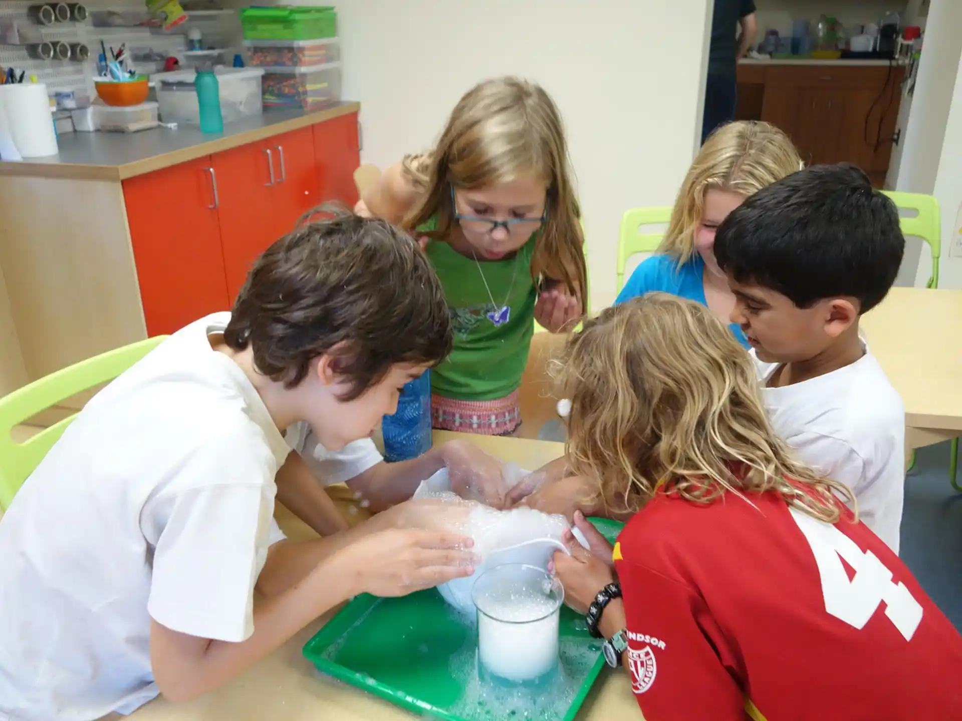 a group of children in a classroom