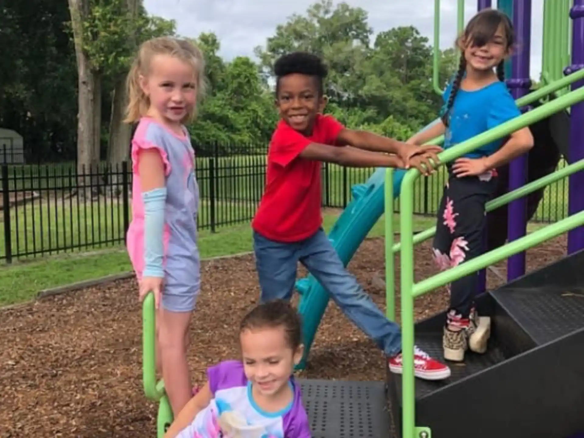 a group of kids on a playground