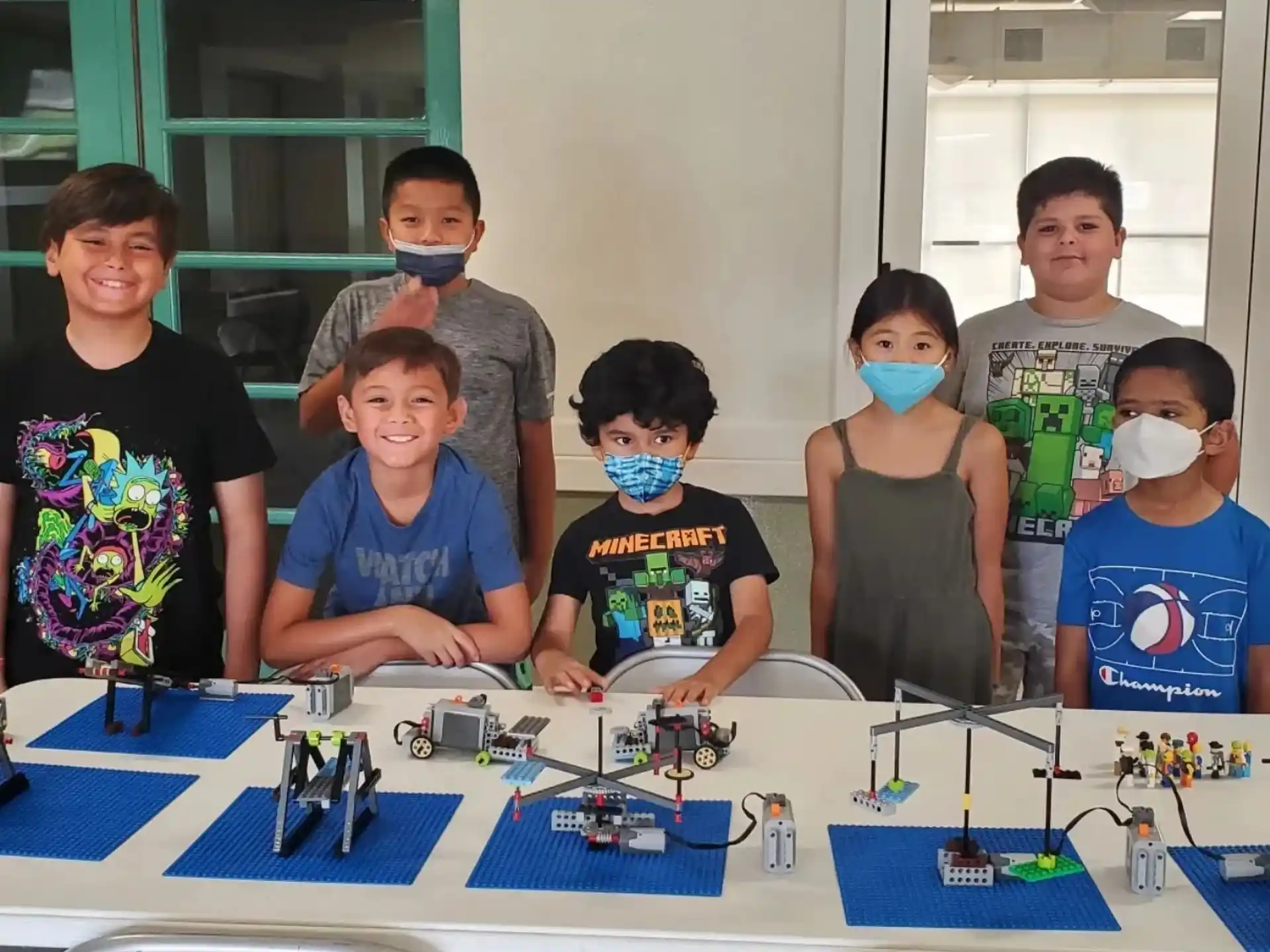 a group of kids wearing masks