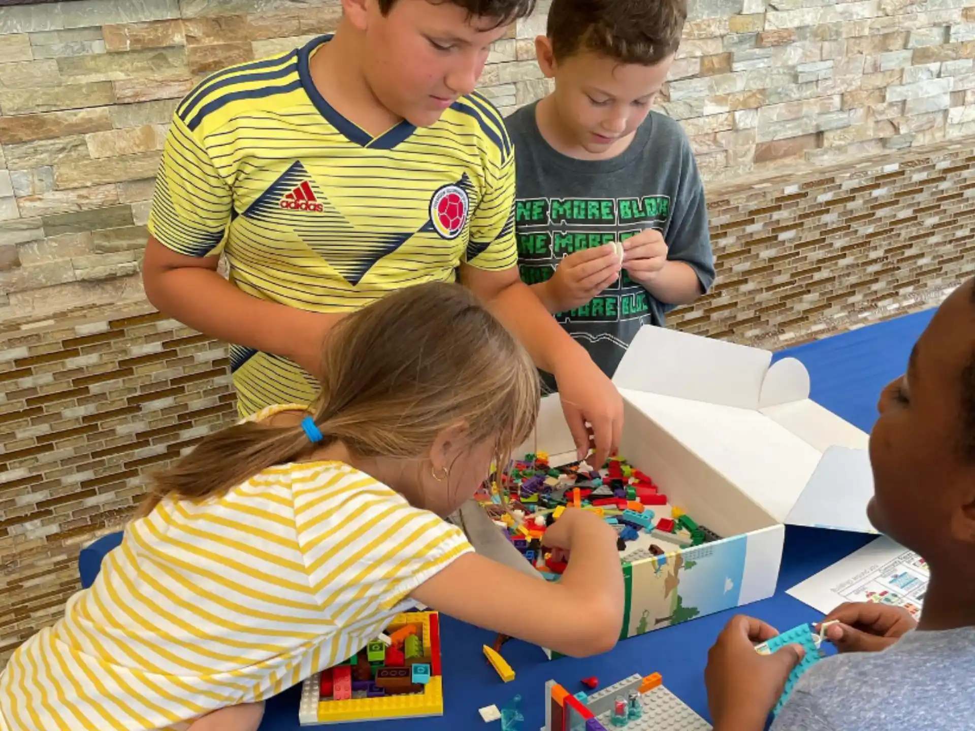 a group of children playing with toys