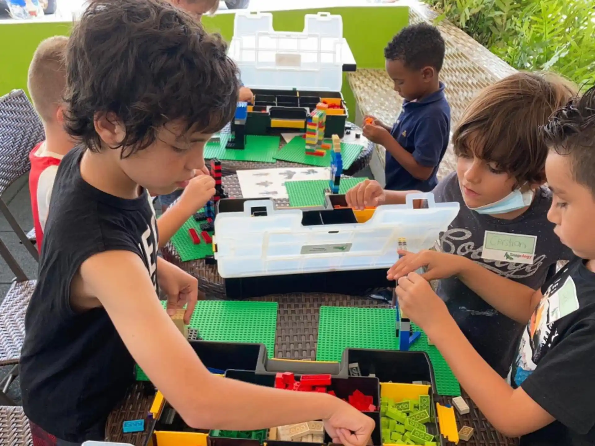 a group of children playing with toys