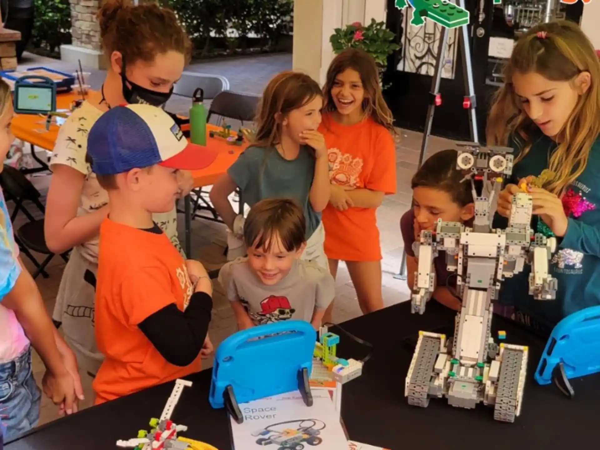 a group of children playing with toys