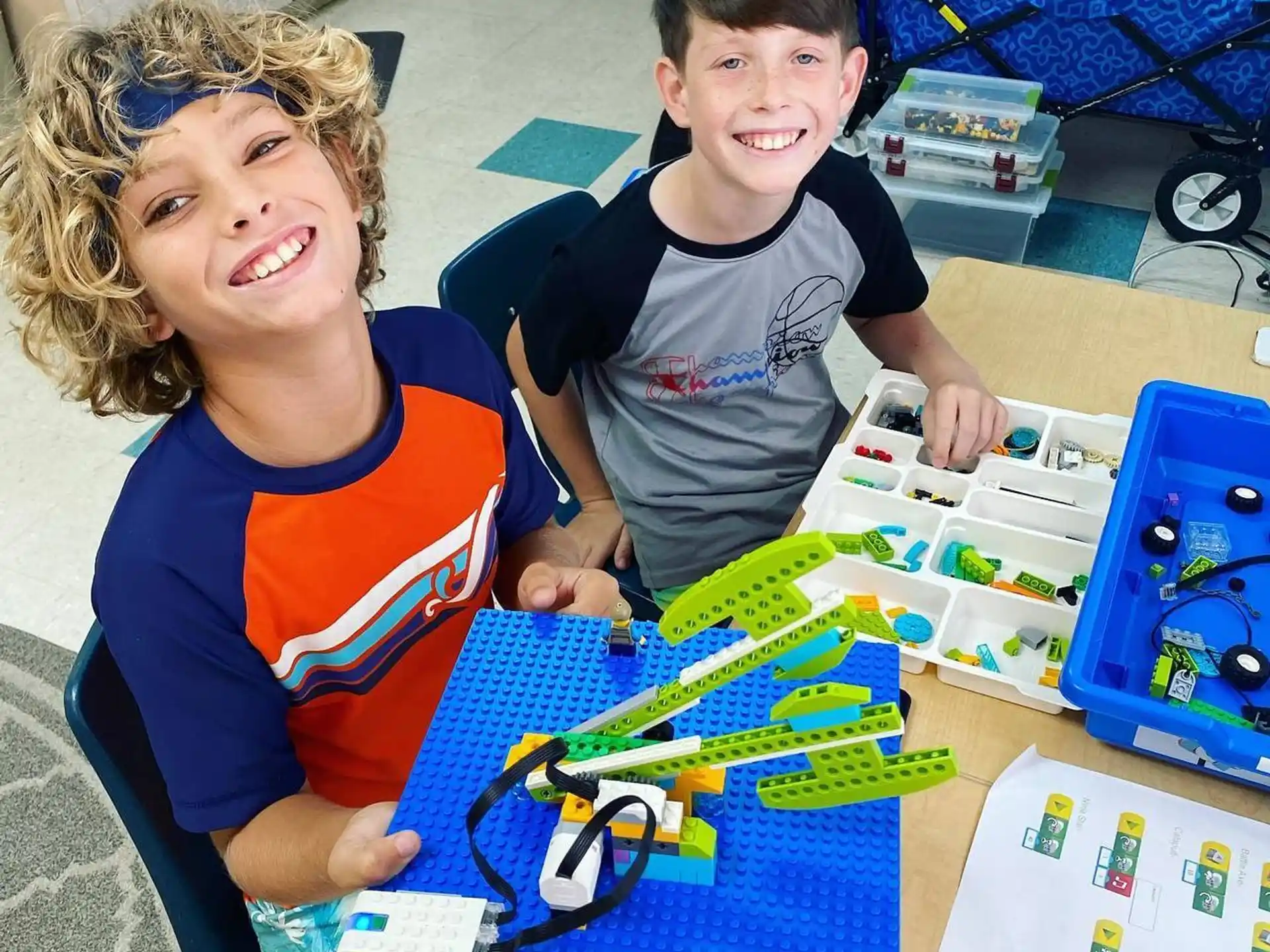 a couple of boys playing a board game