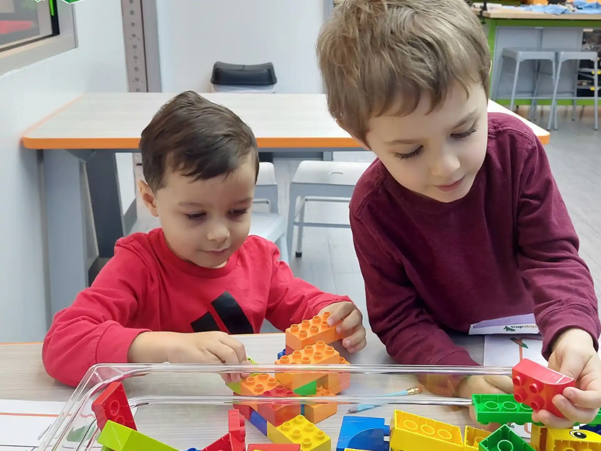a couple of kids playing with toys