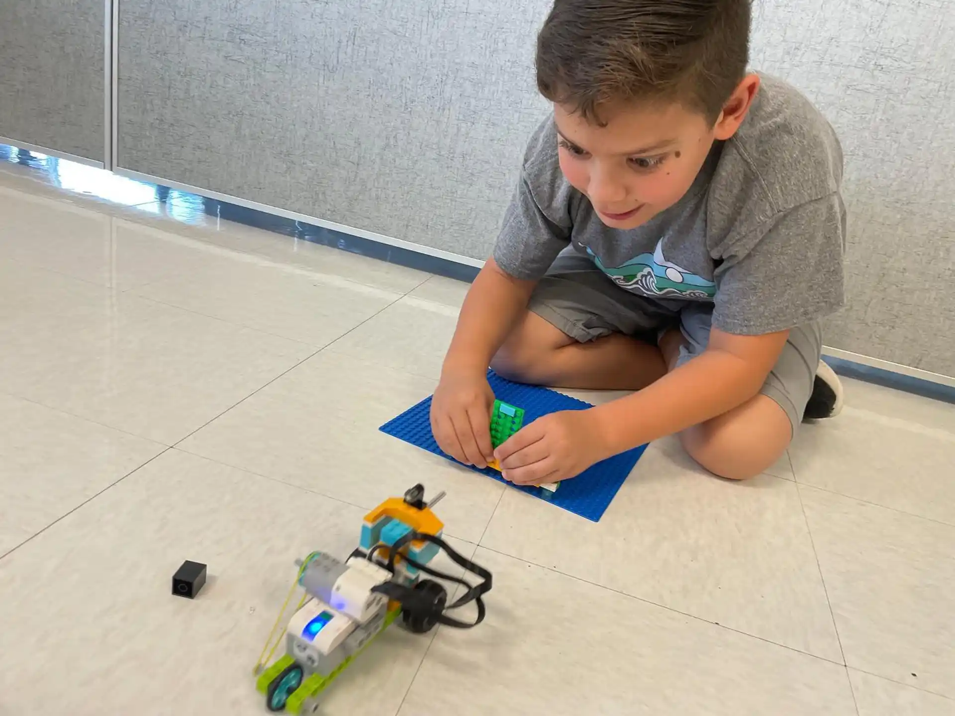 a boy playing with toys