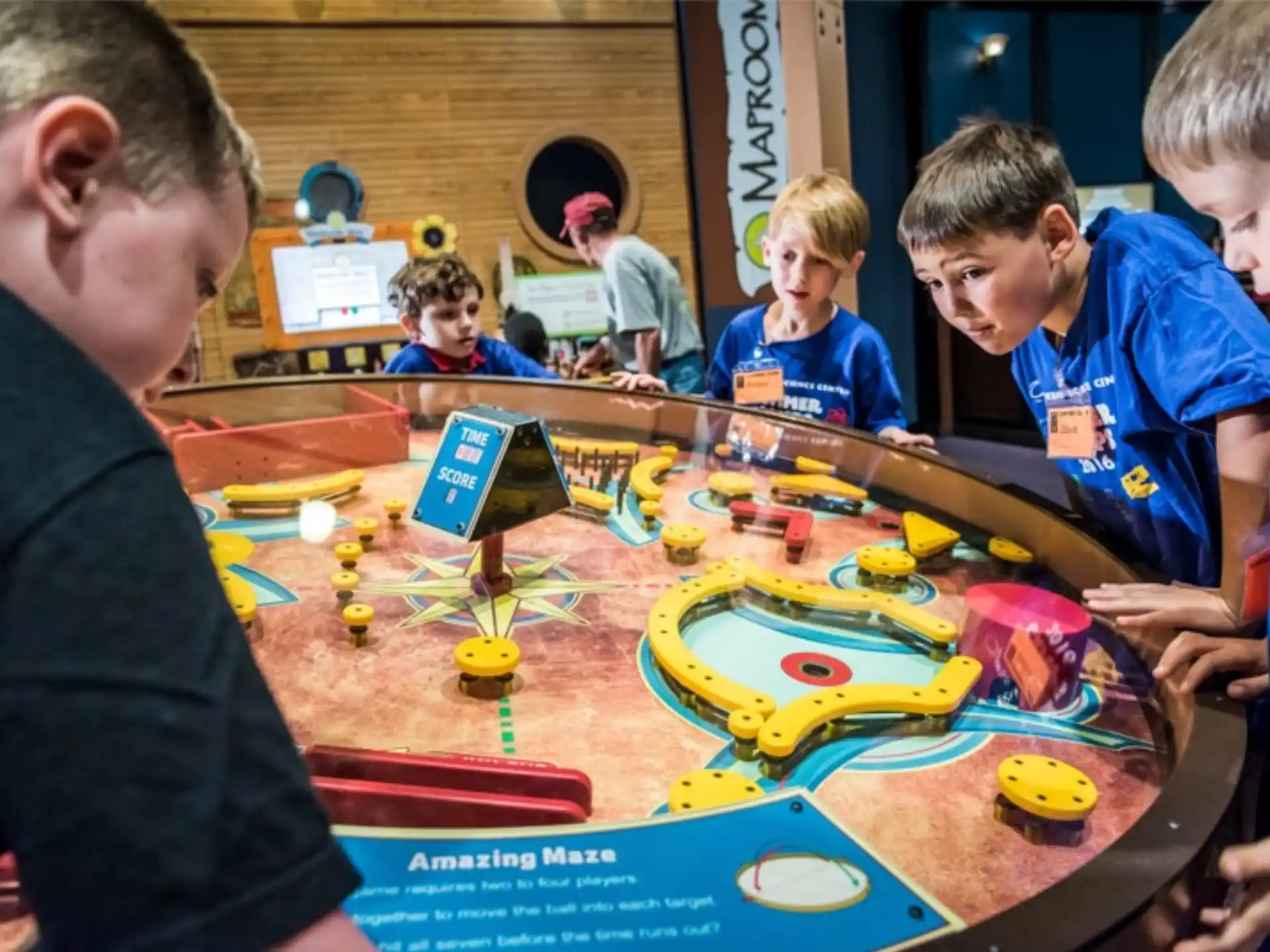 a group of children playing a board game