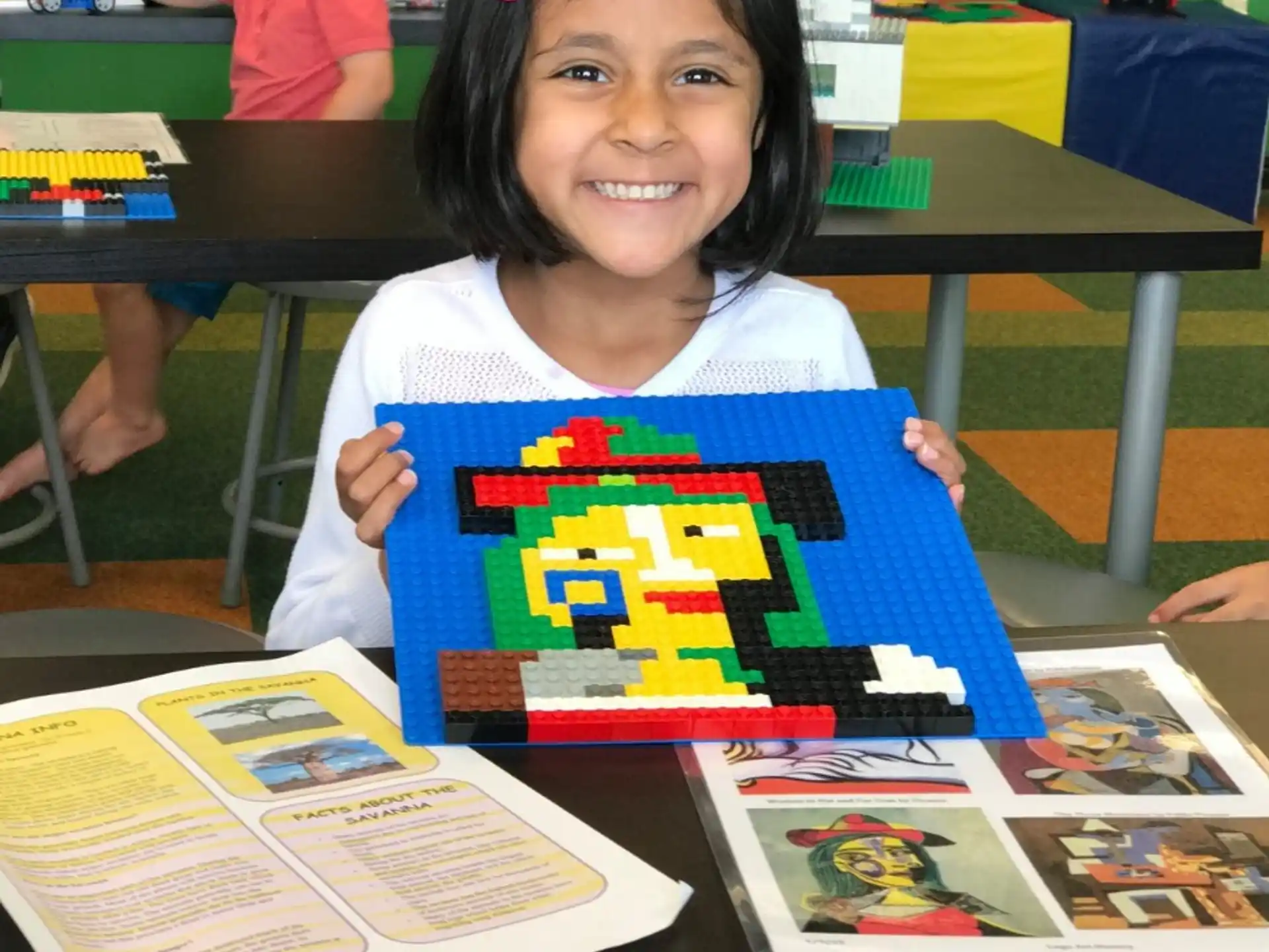 a girl holding a book