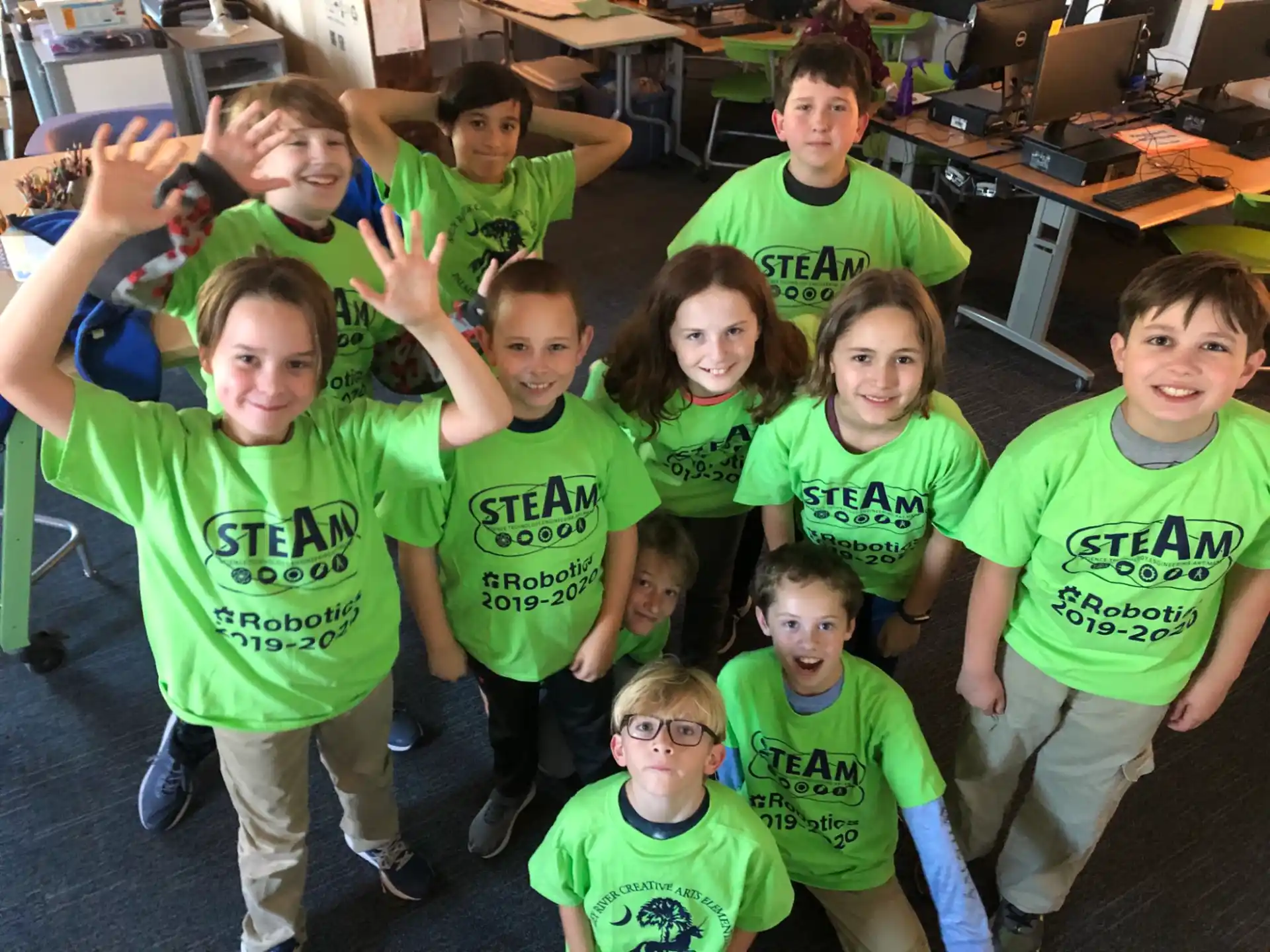 a group of children posing for a photo