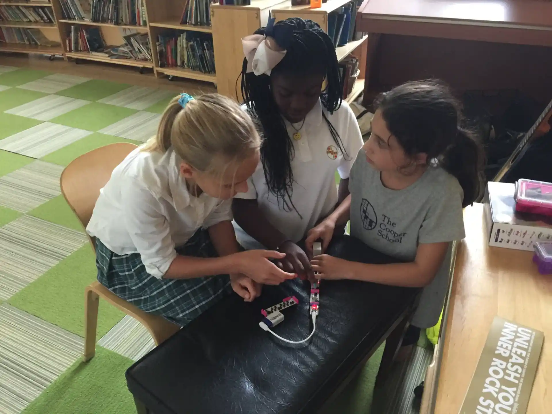 a group of women working on a project