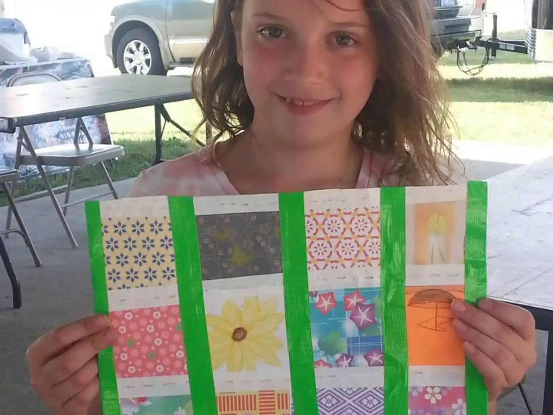 a girl holding a book