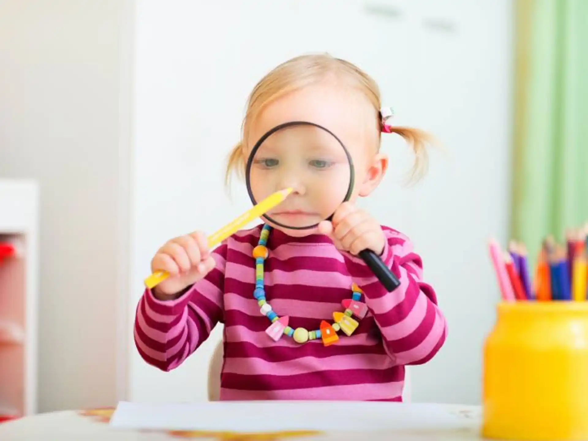 a little girl brushing her teeth