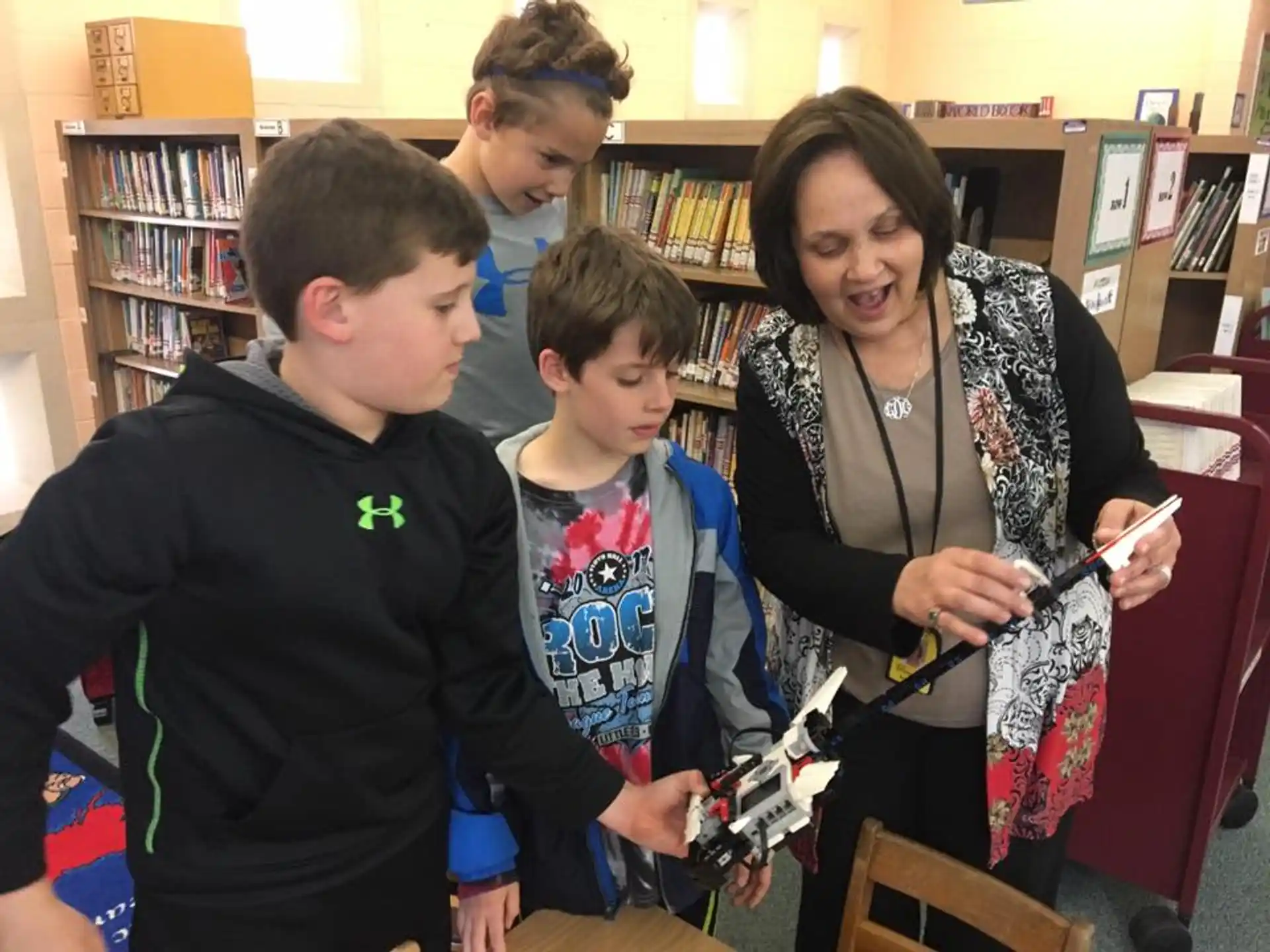 a group of people in a library