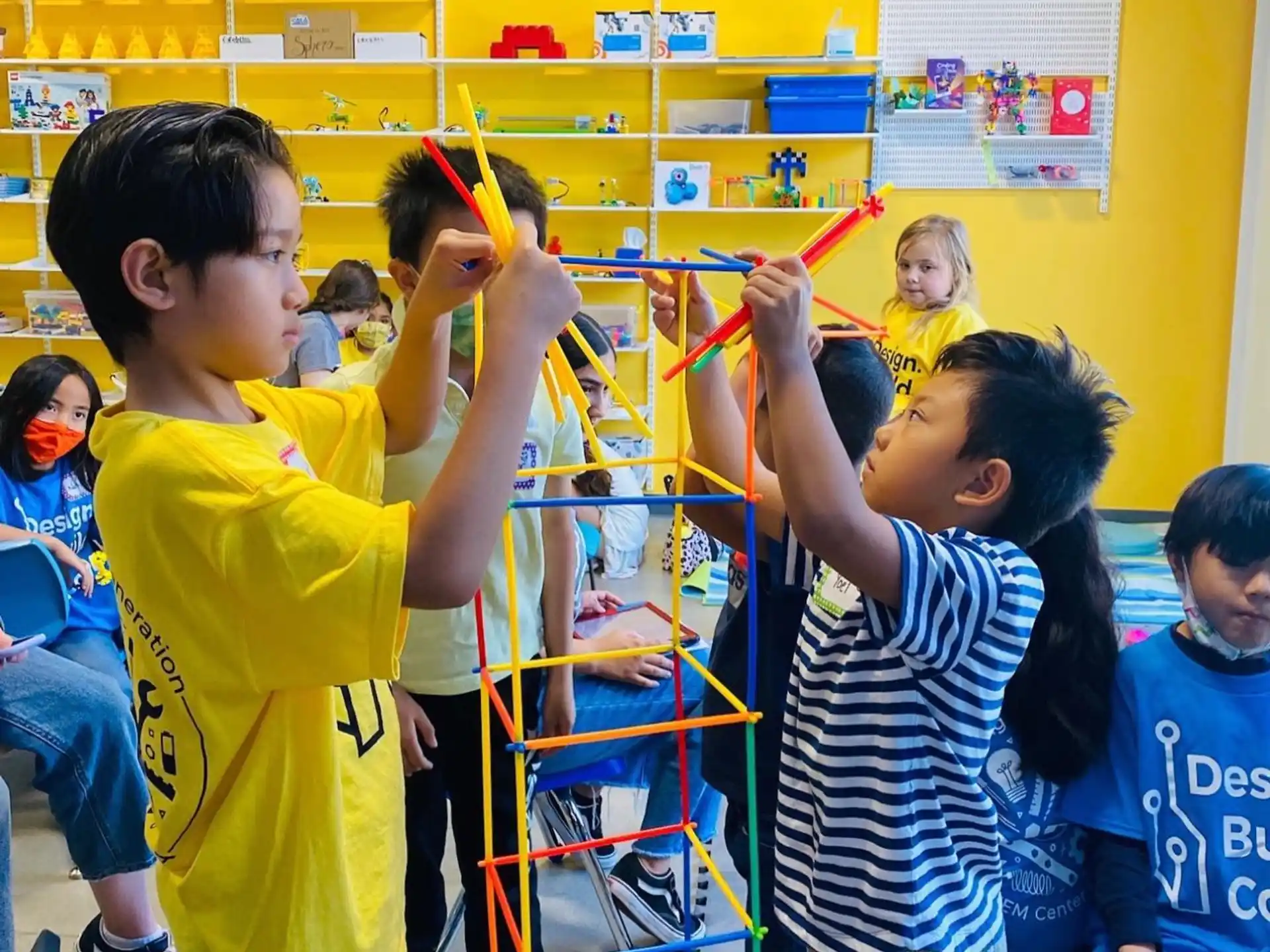 a group of children playing with a toy