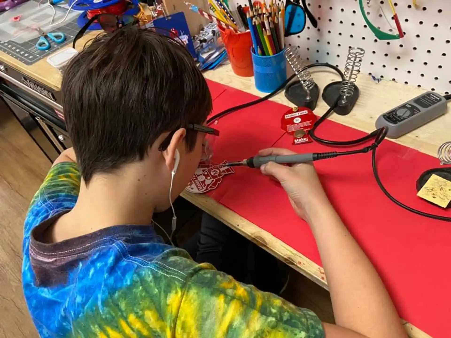 a boy with a stethoscope around his neck