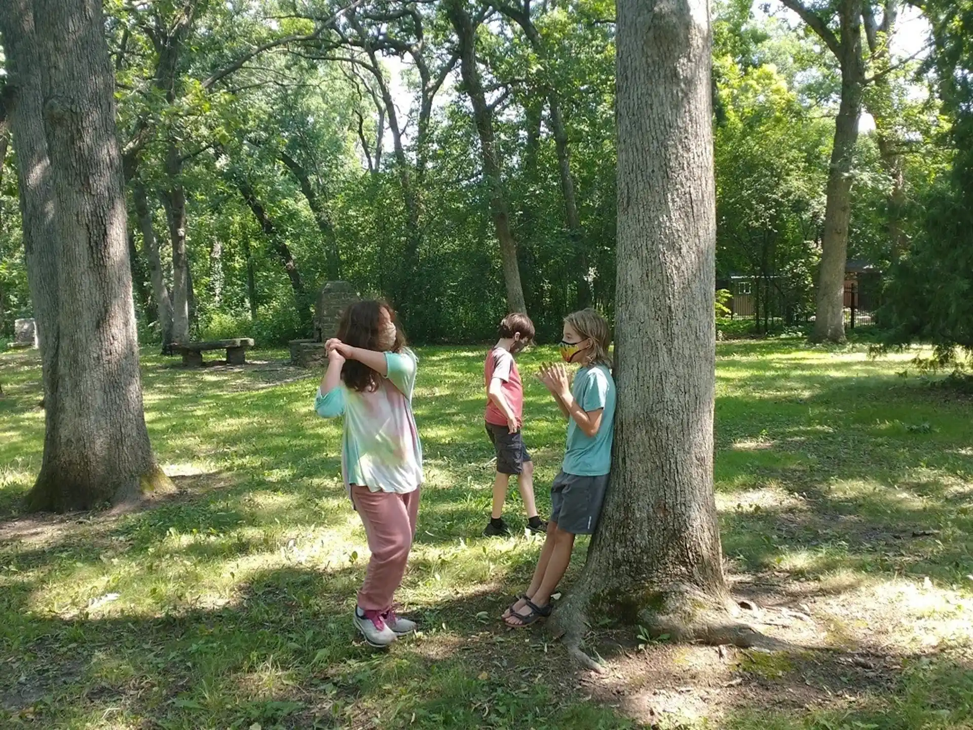 a group of kids playing in a park