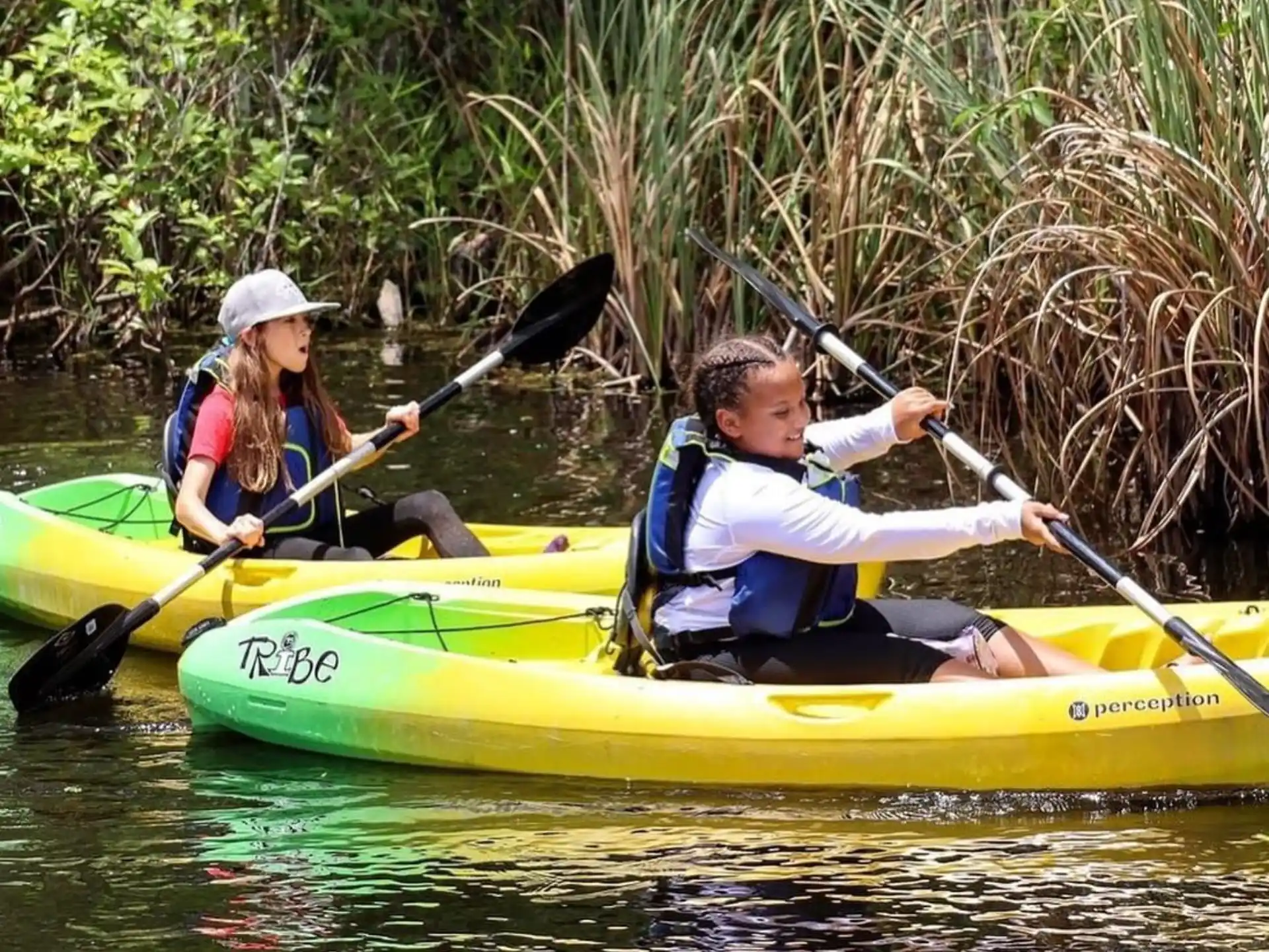 a couple of people in a canoe