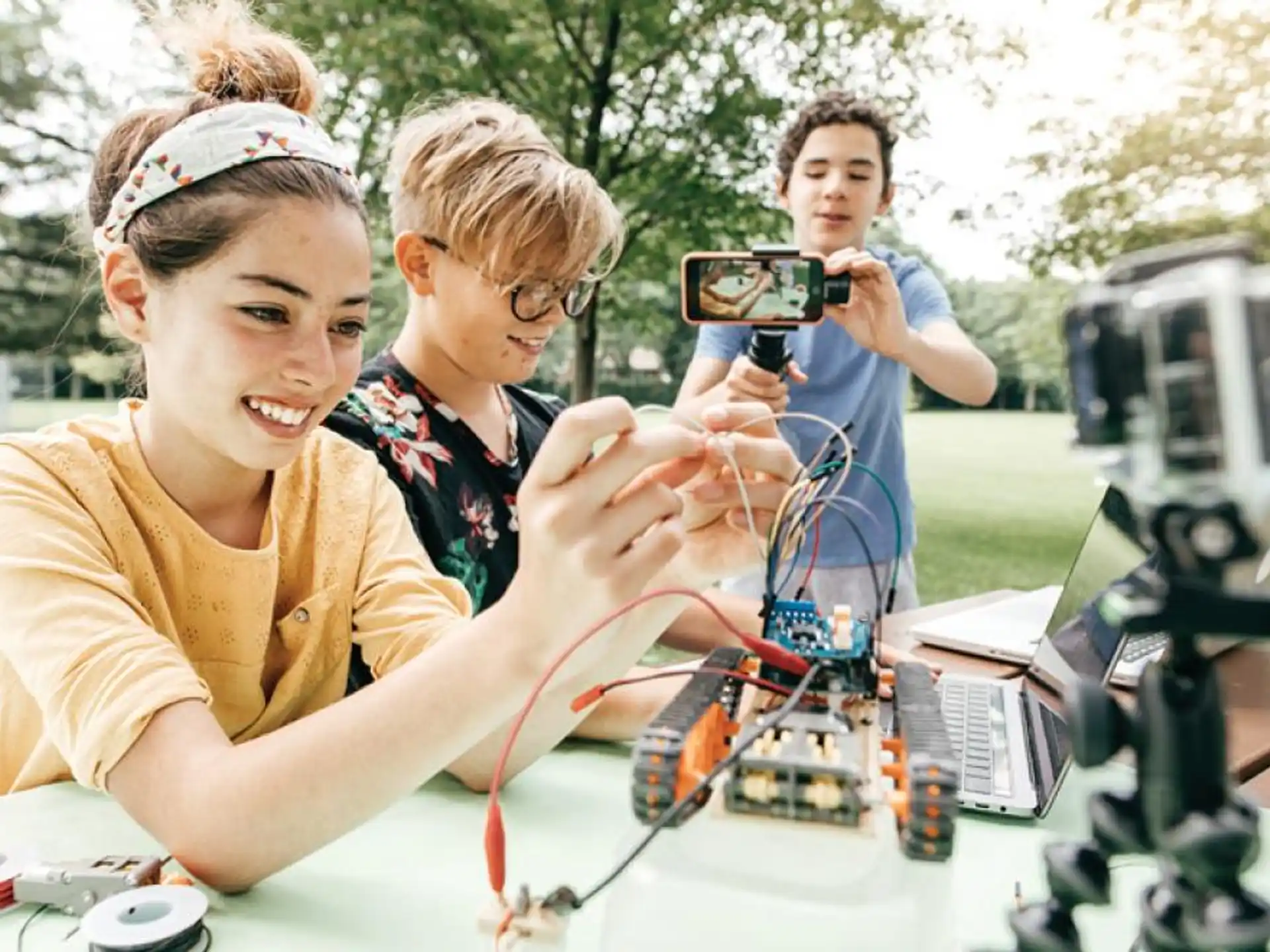 a group of people looking at a camera