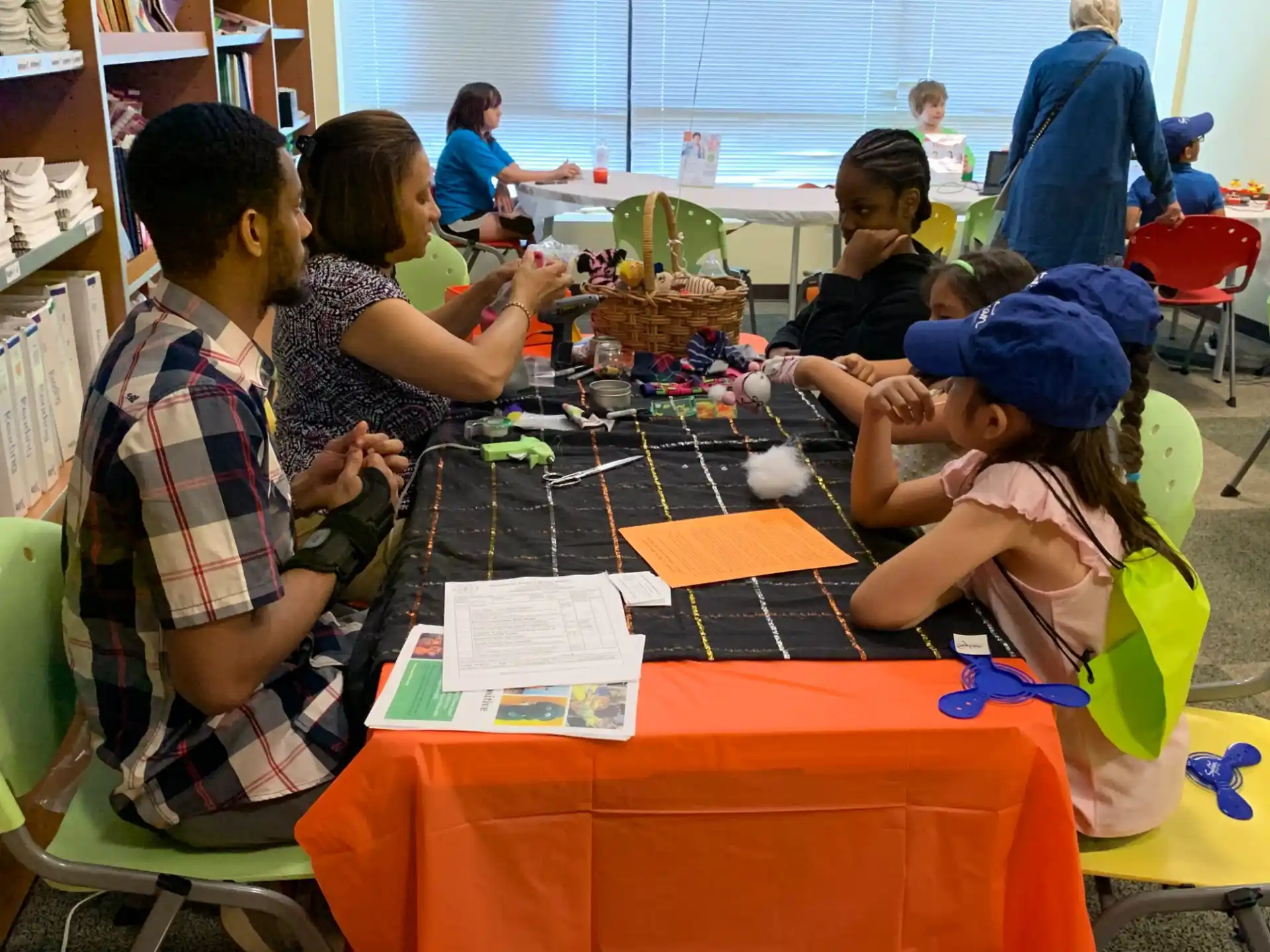 a group of people sitting around a table