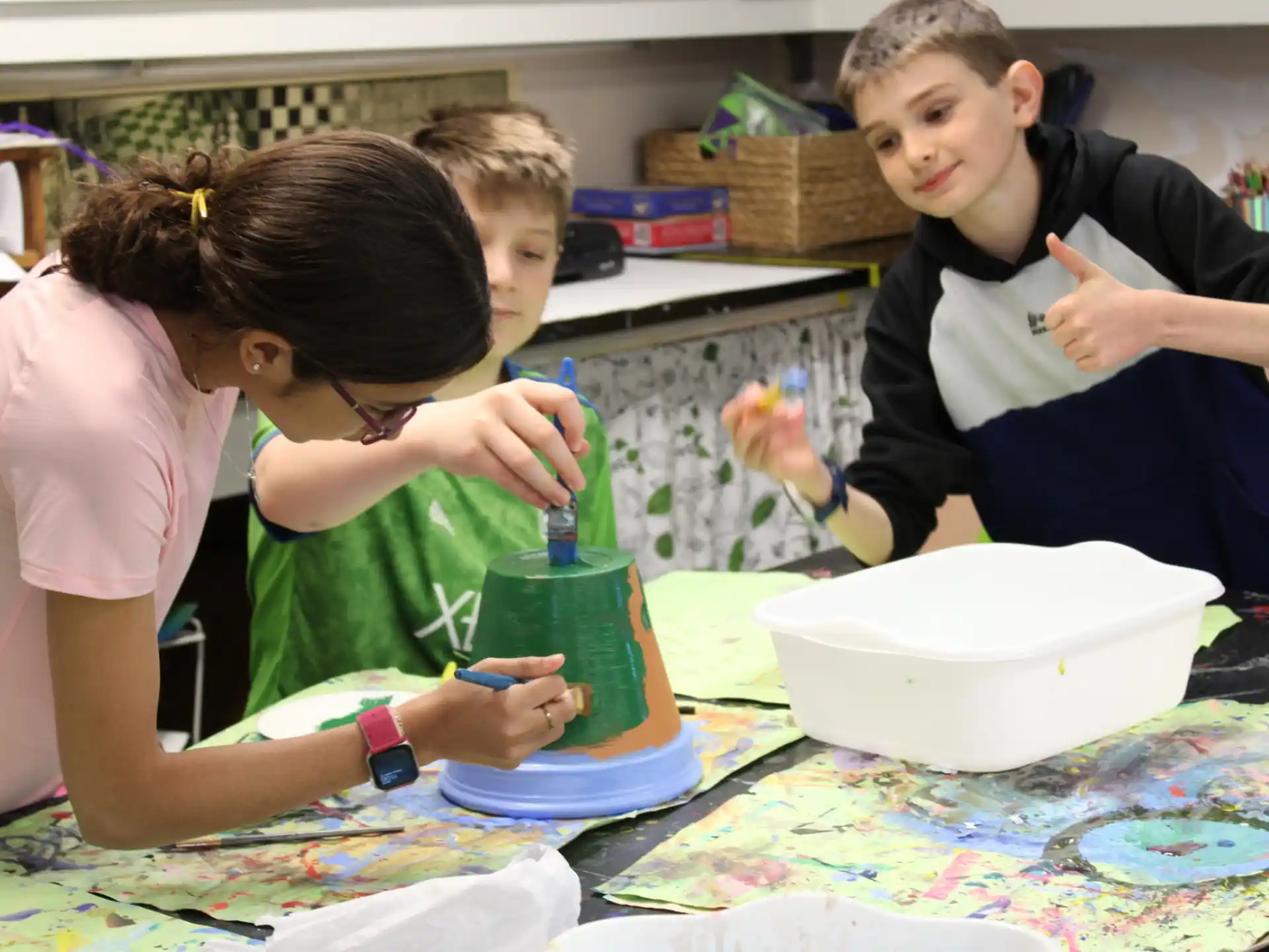 a group of people painting