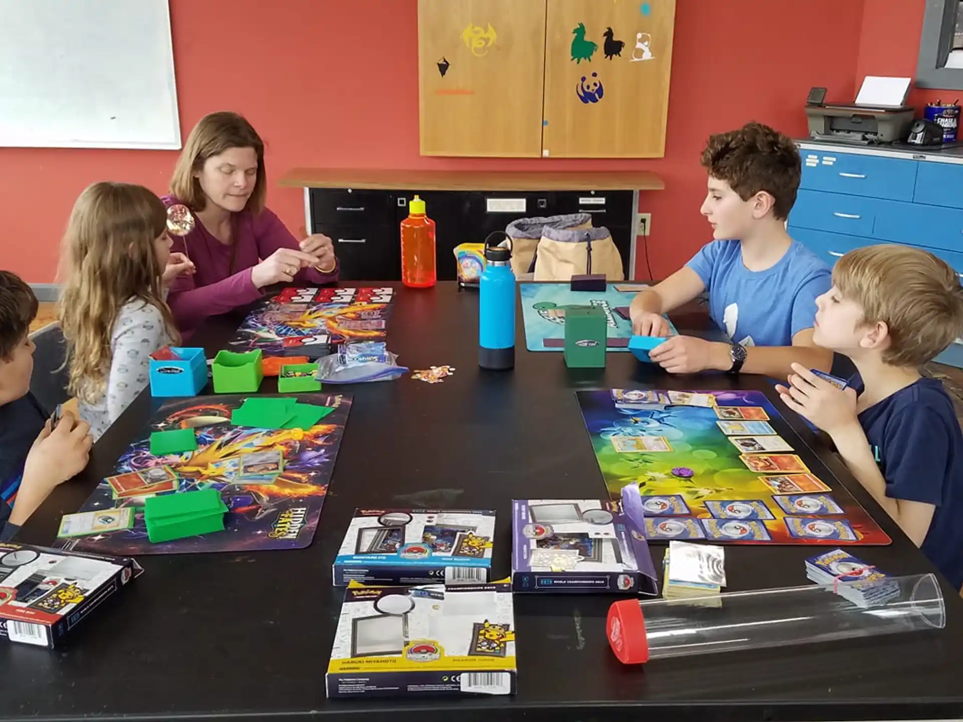 a group of children playing a board game