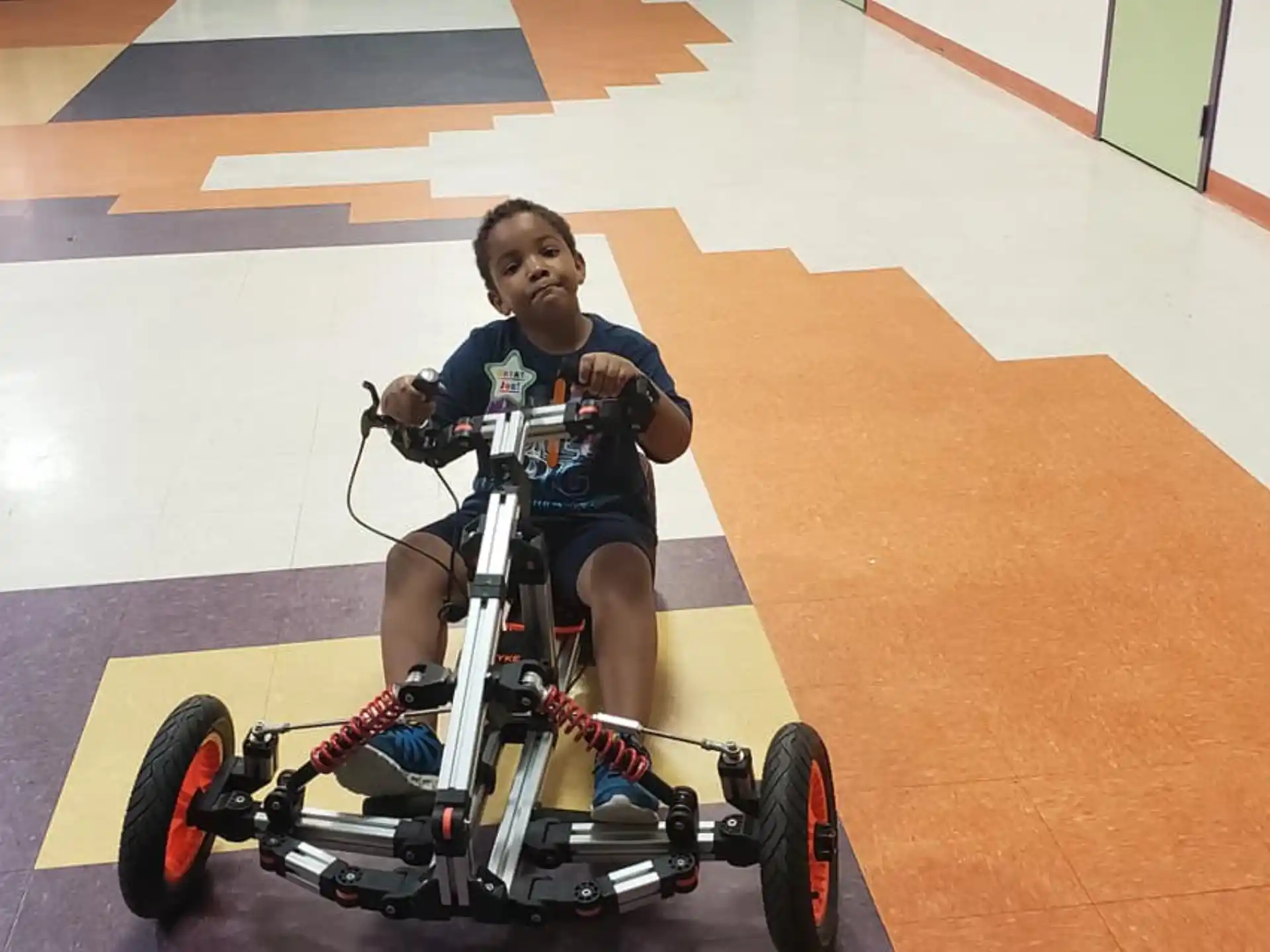 a person riding a tricycle