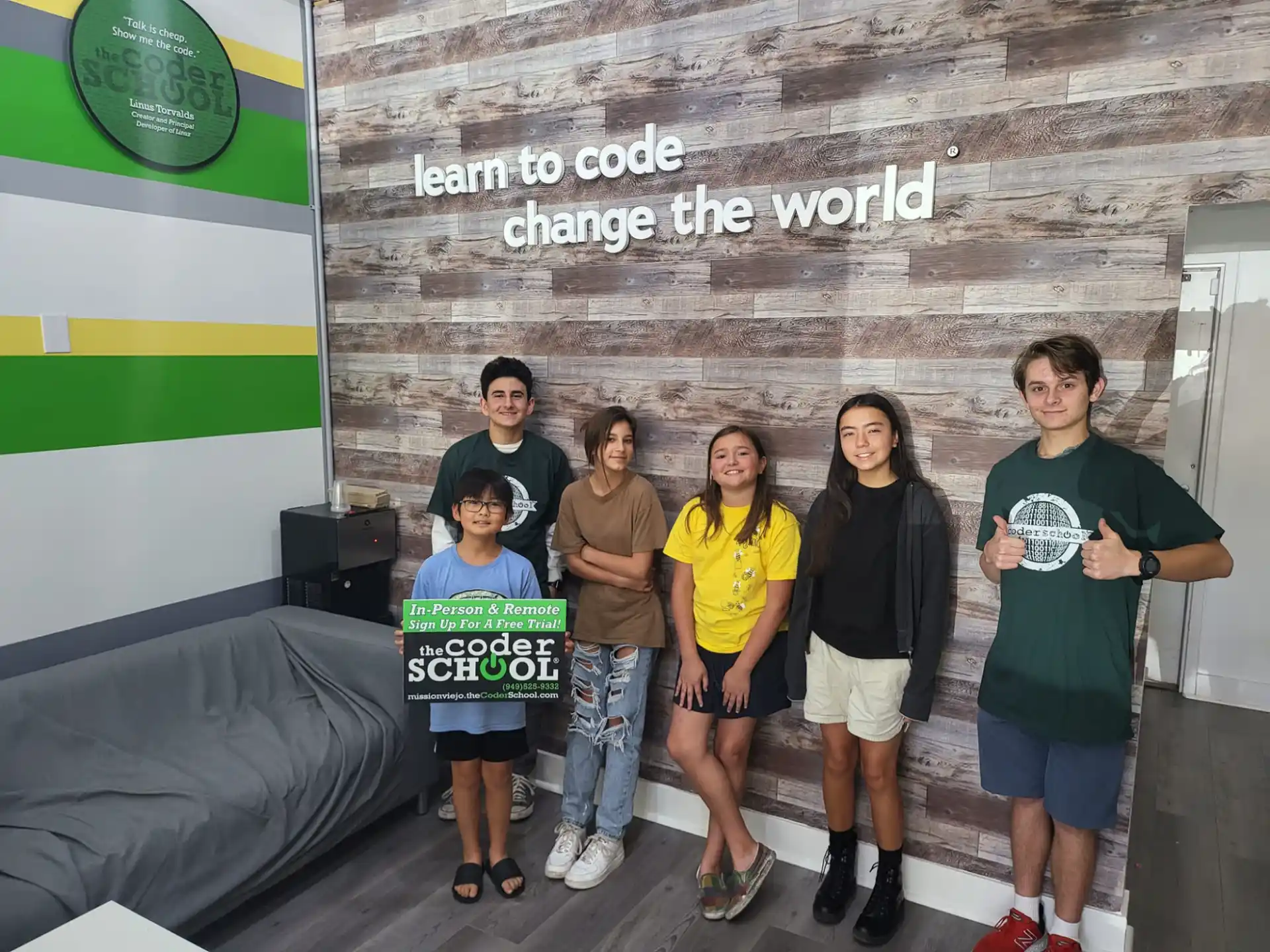 a group of people posing for a photo