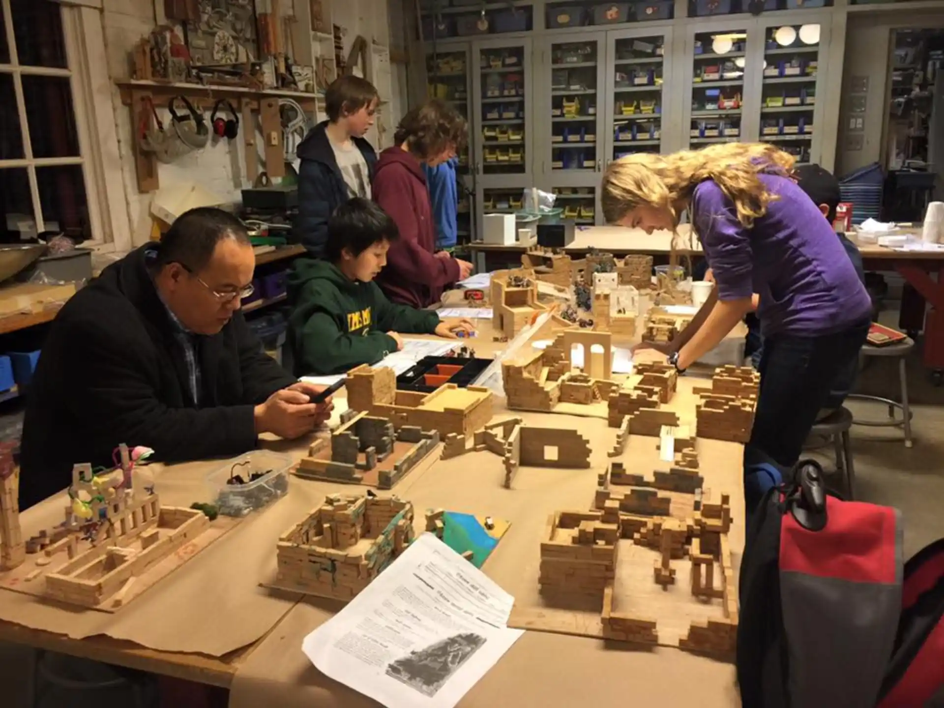 a group of people playing chess