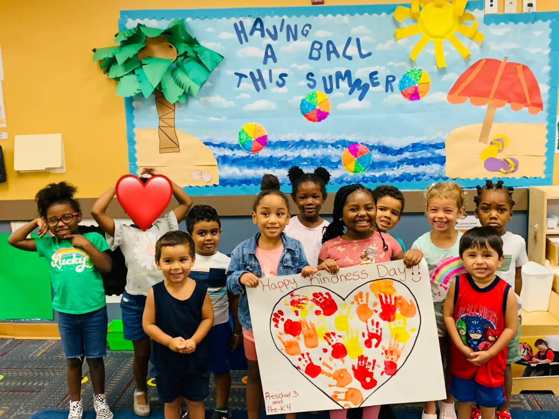 a group of children holding a sign
