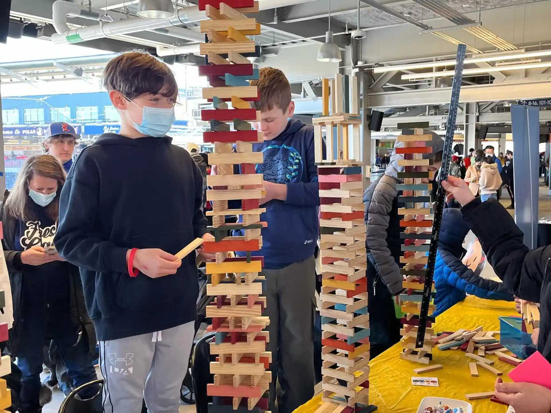 a group of people in a factory