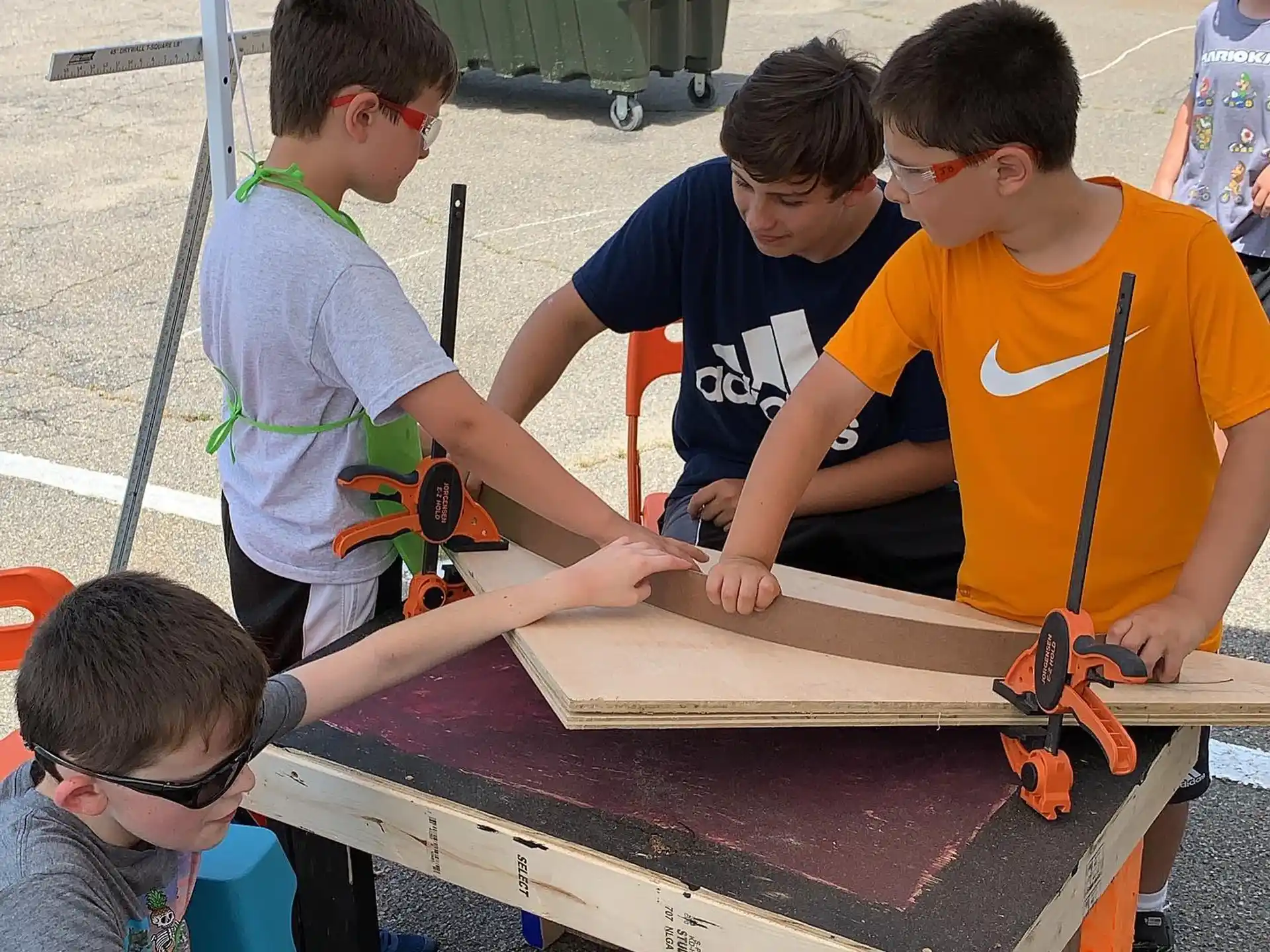 a group of boys working on a project