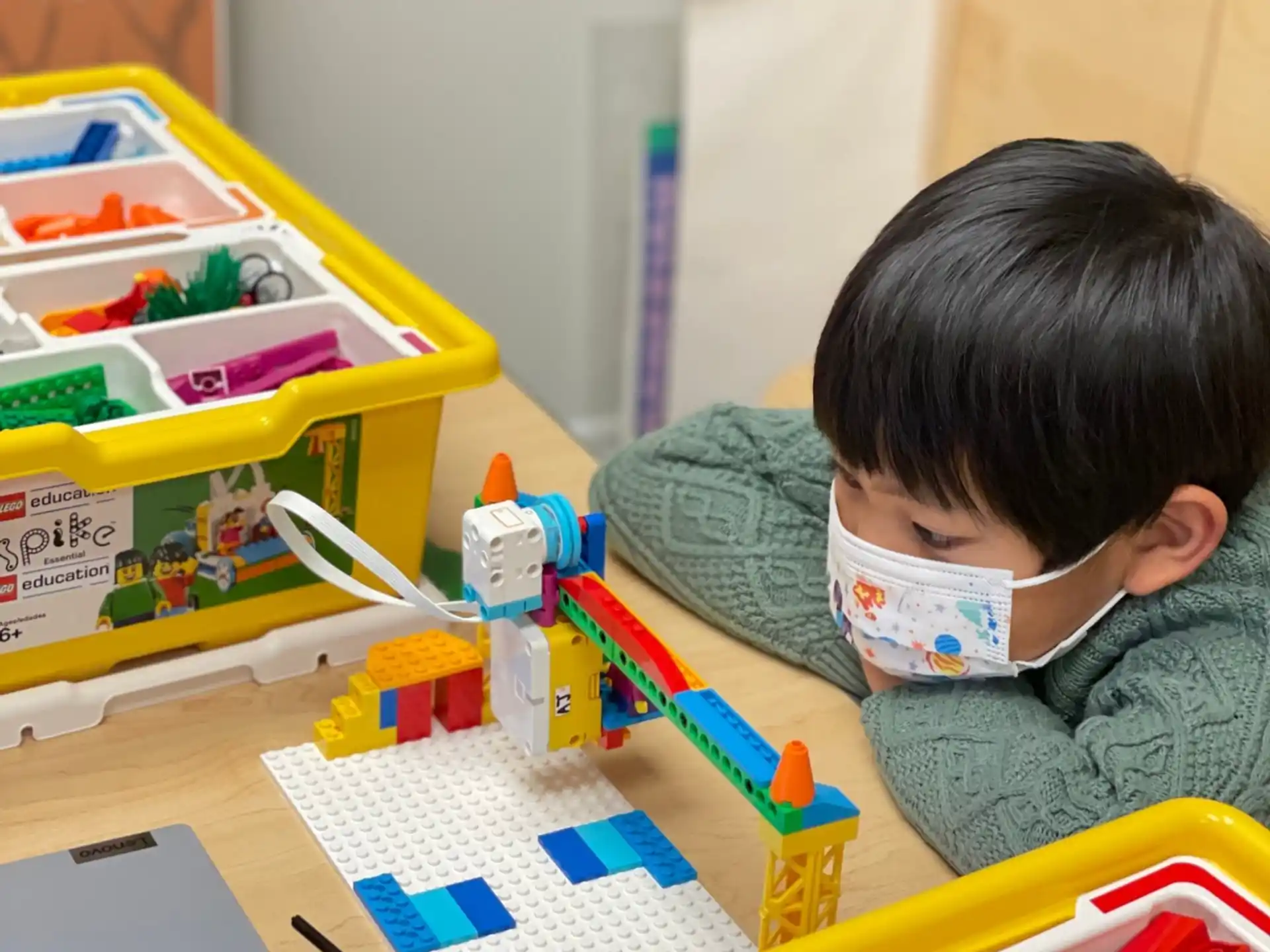 a baby playing with toys