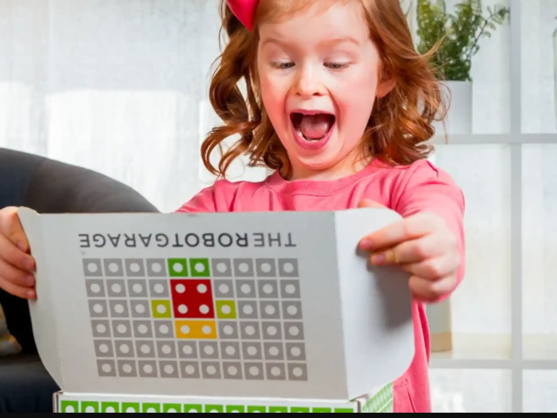 a child holding a tablet