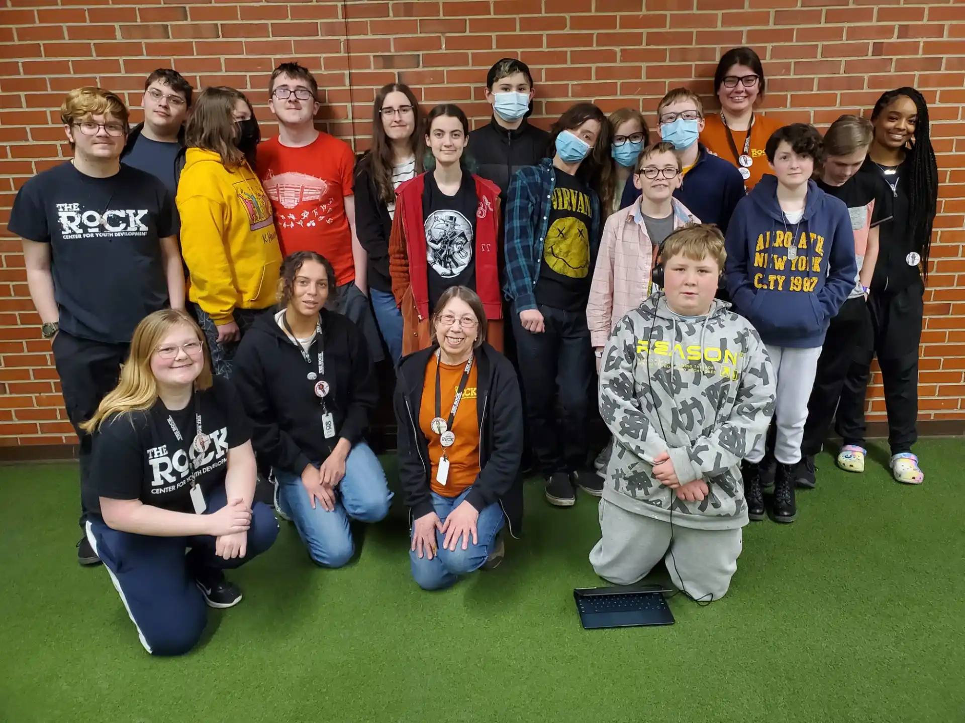 a group of people posing for a photo