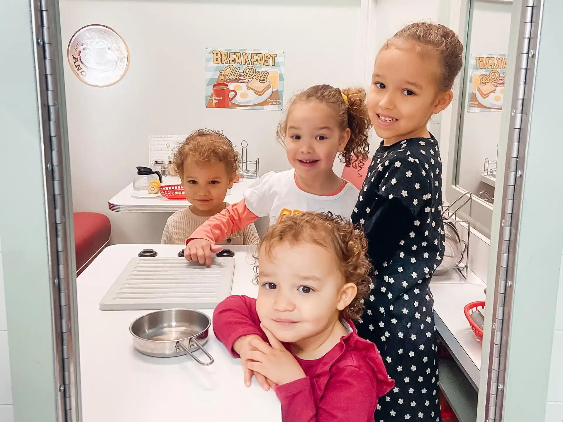 a group of children posing for a photo