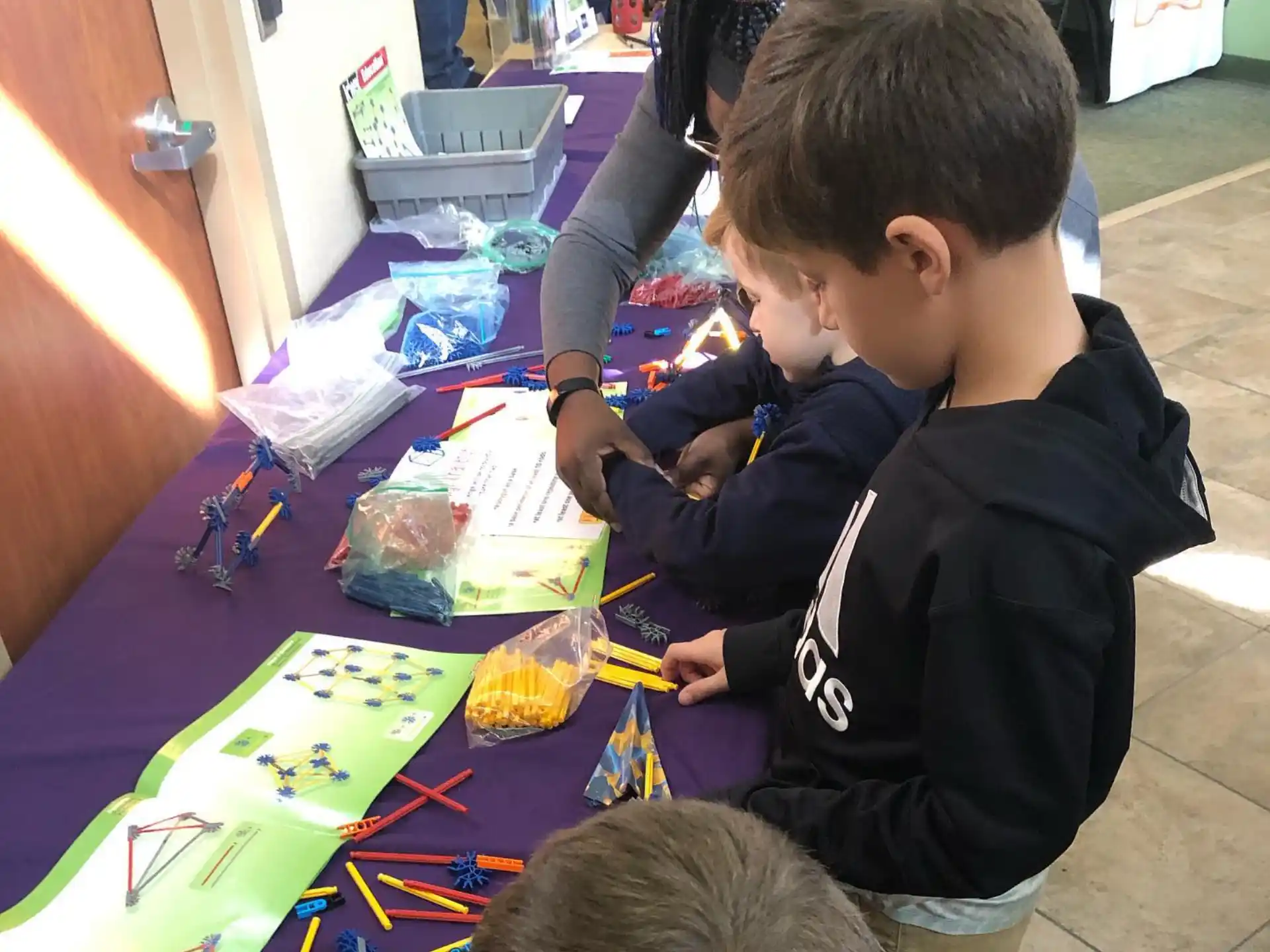 a boy painting on a table