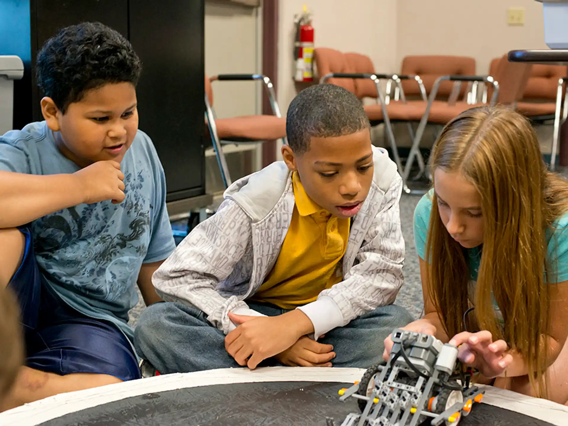 a group of children playing with toys