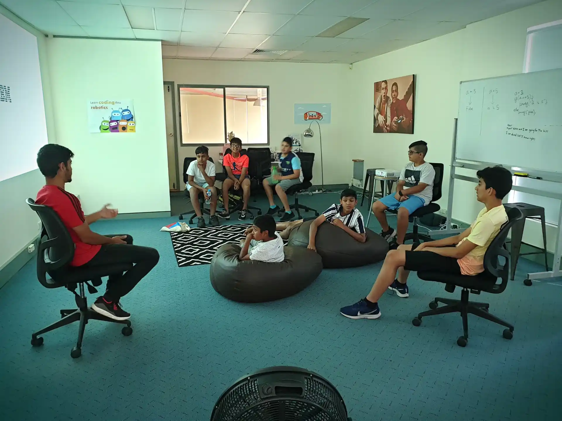 a group of people sitting in chairs
