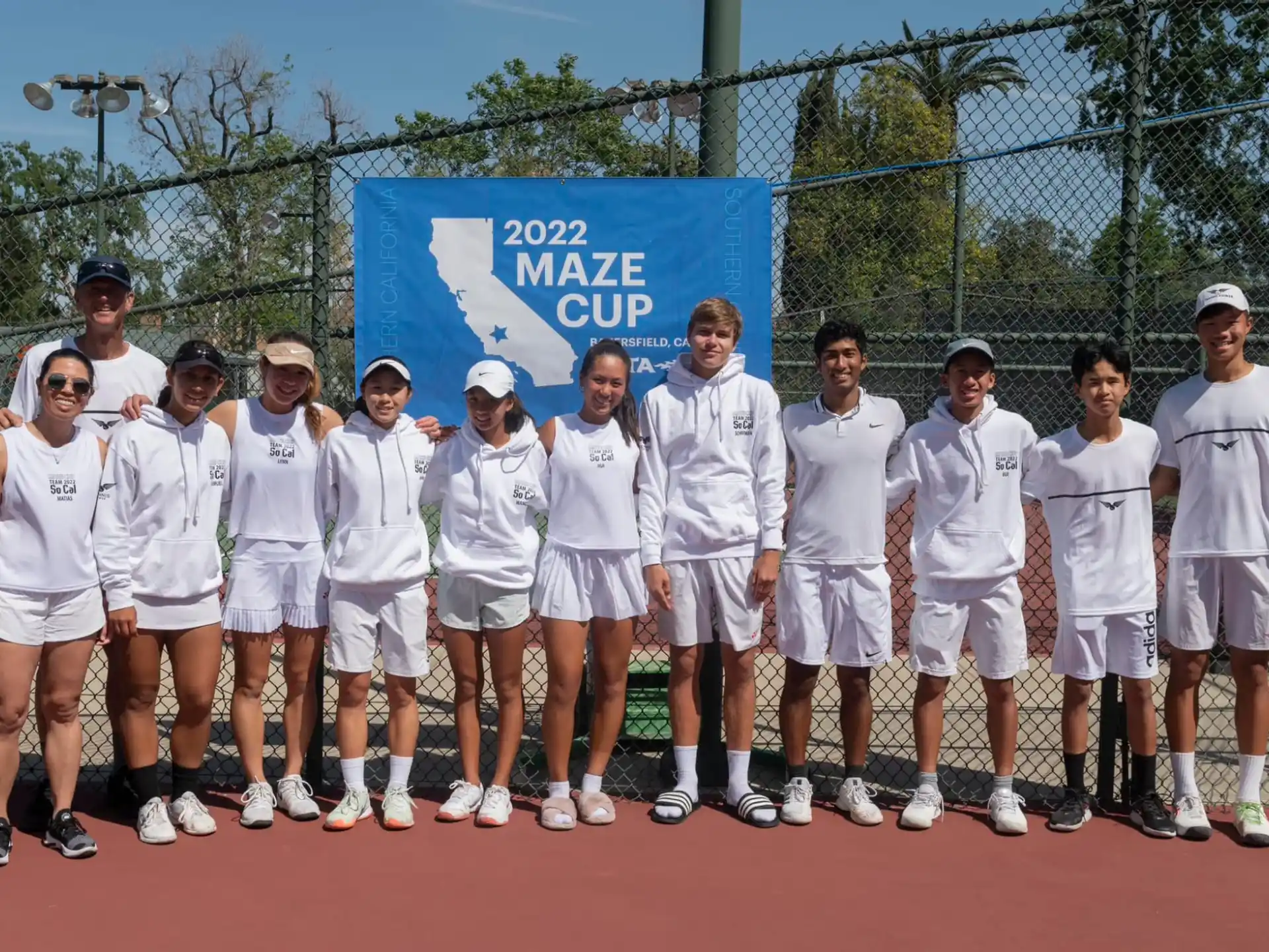 a group of people wearing white shirts