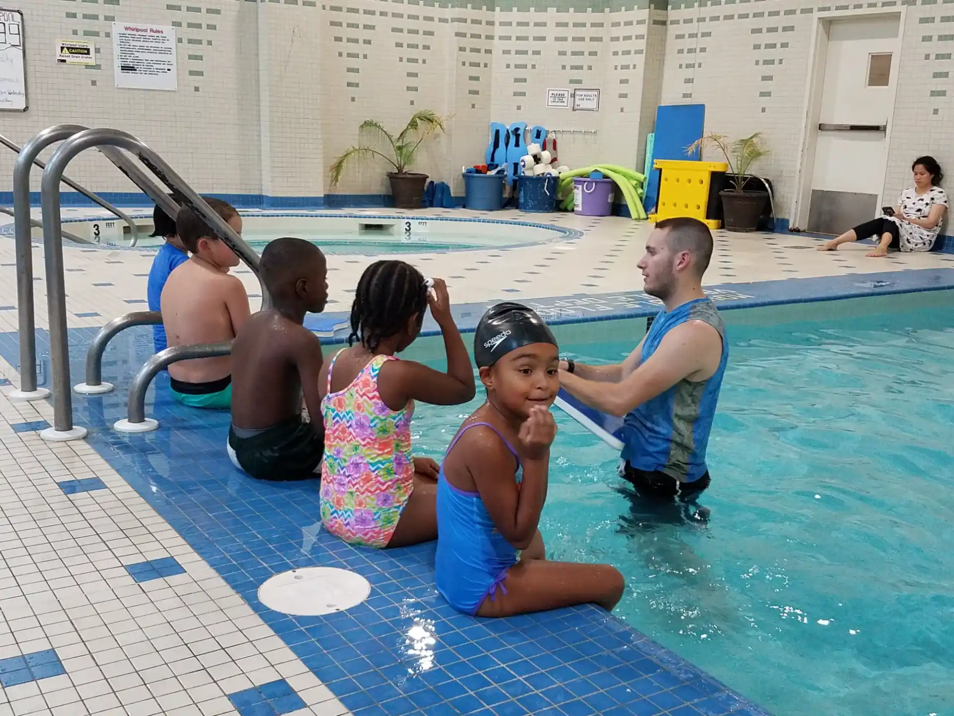 a group of people in a pool