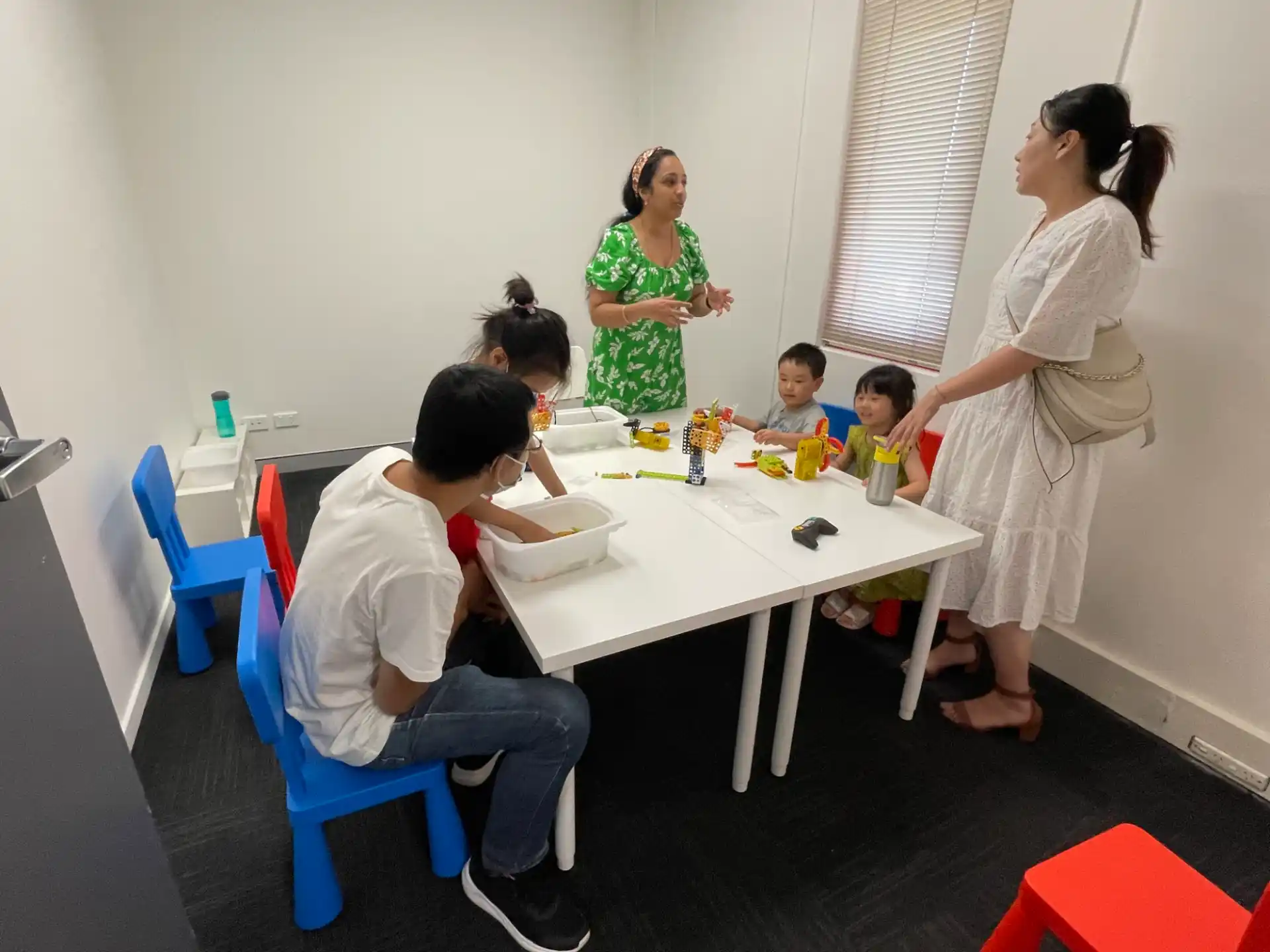 a group of people around a table