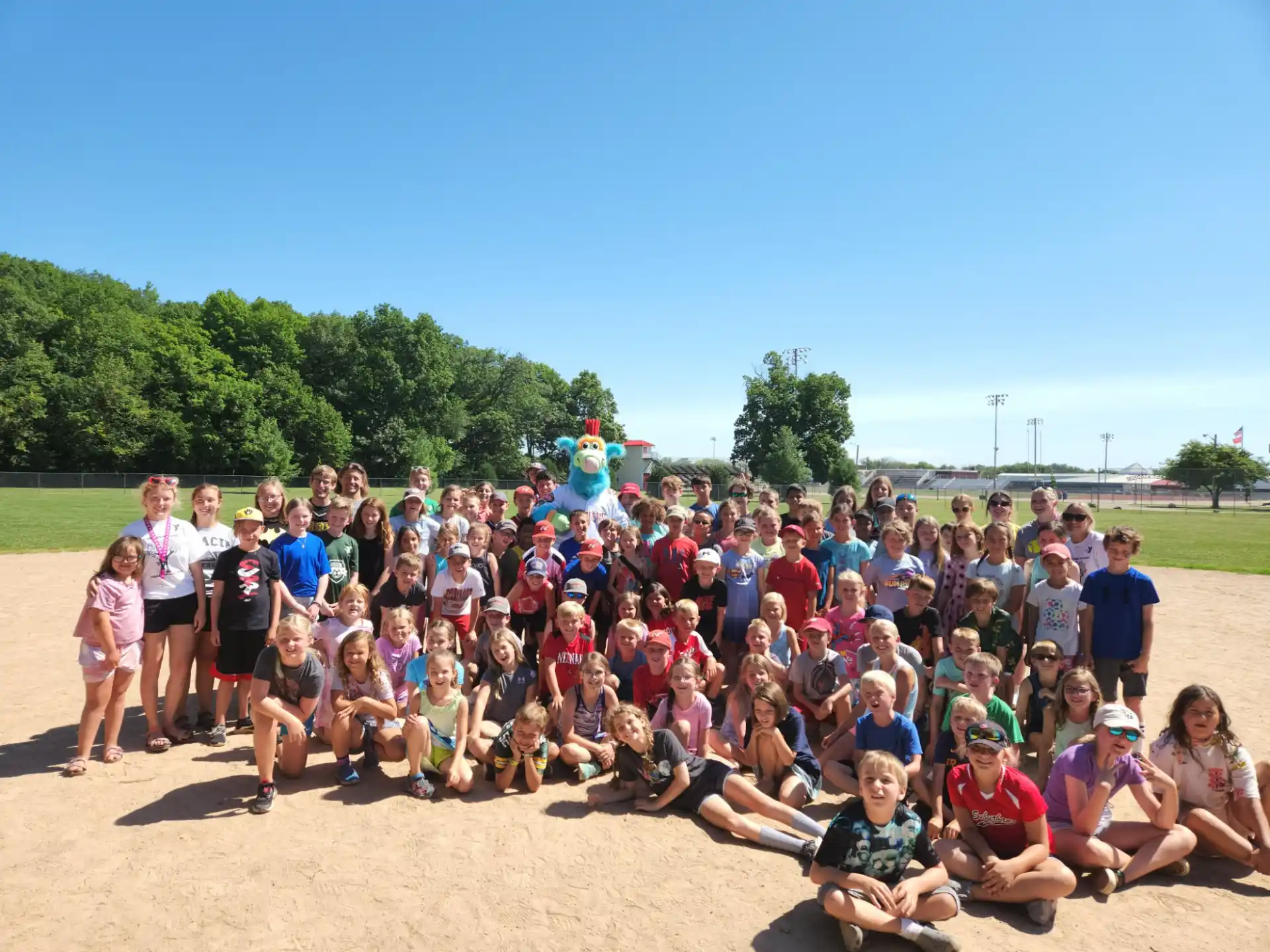 a large group of people posing for a photo