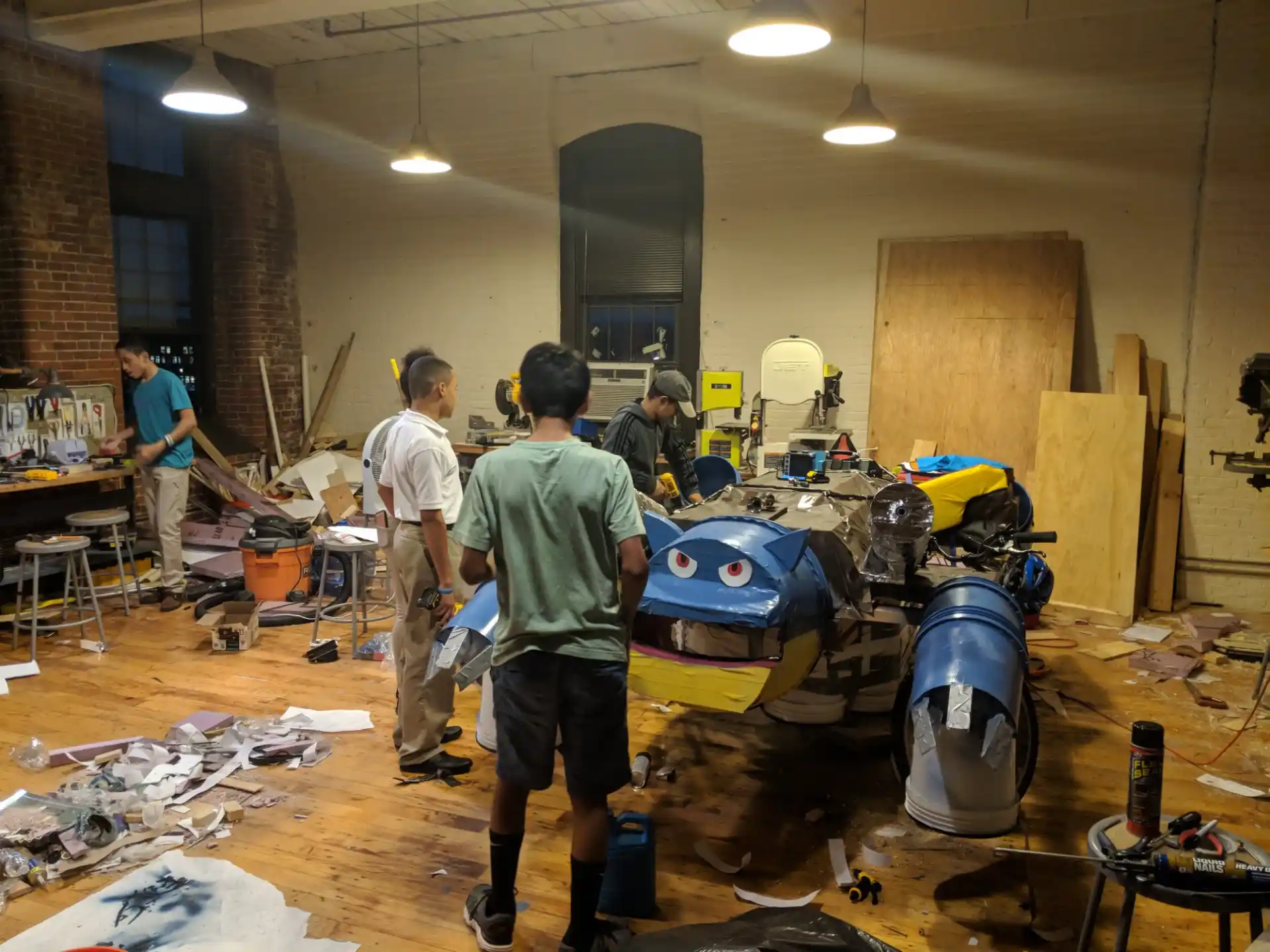 a group of people working in a room