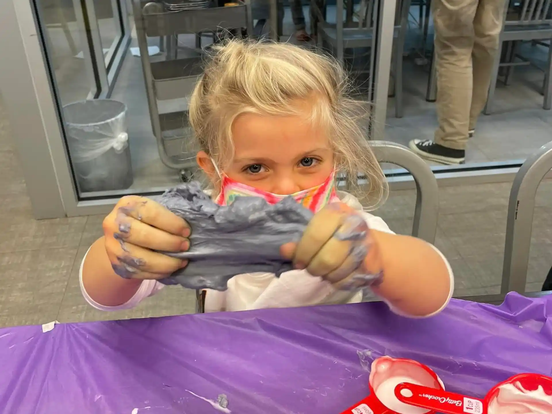 a doll sits on a chair