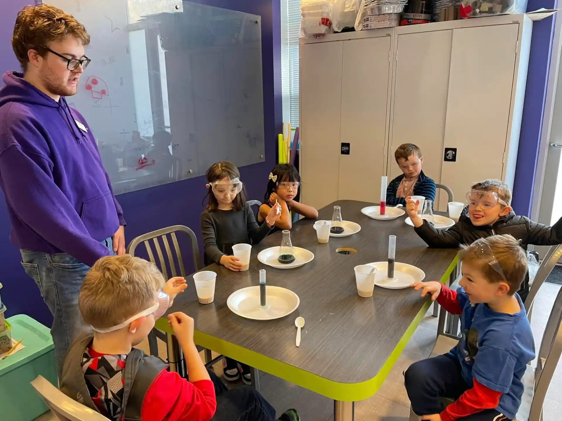 a group of people eating at a table