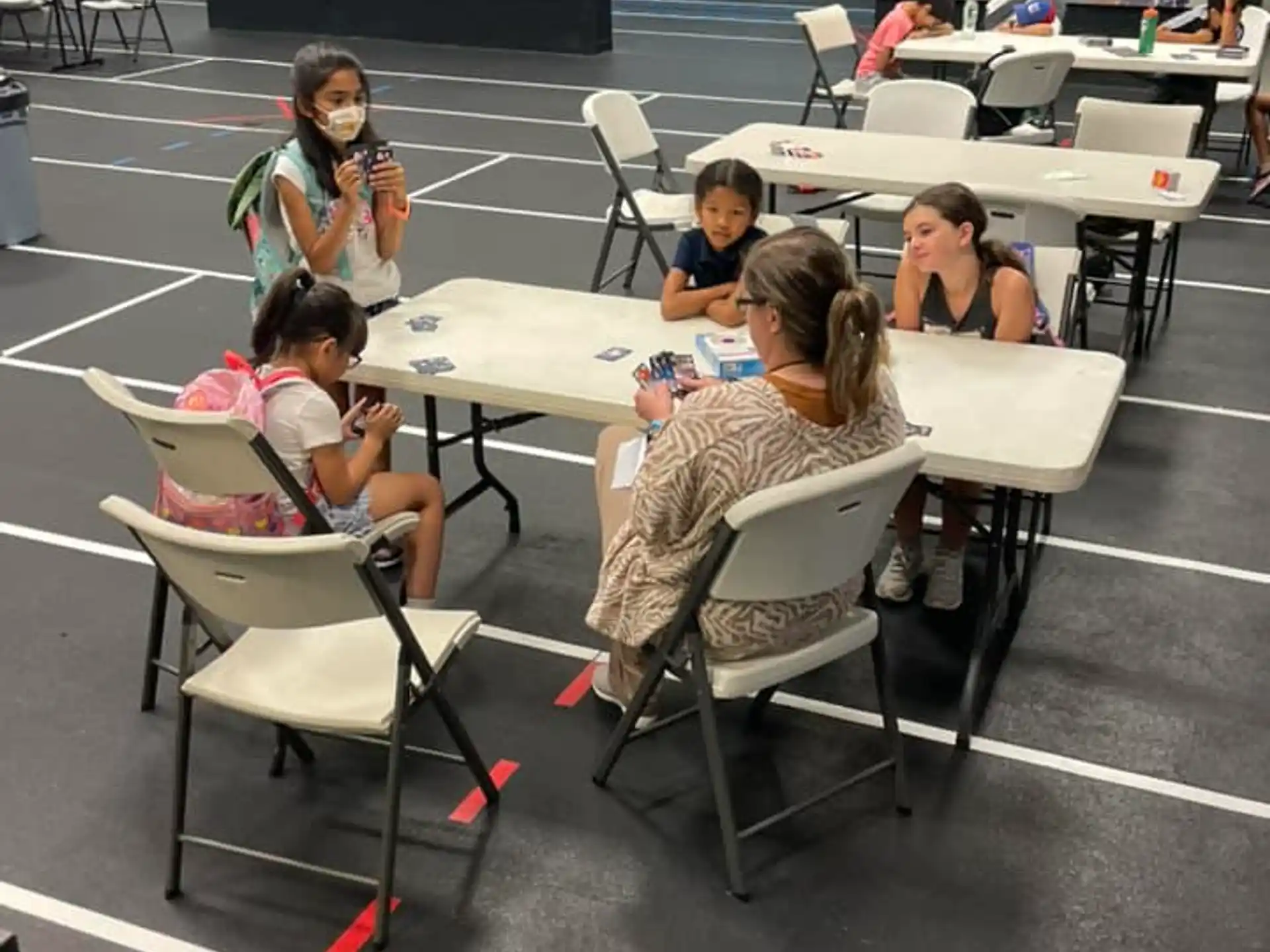 a group of people sitting at a table