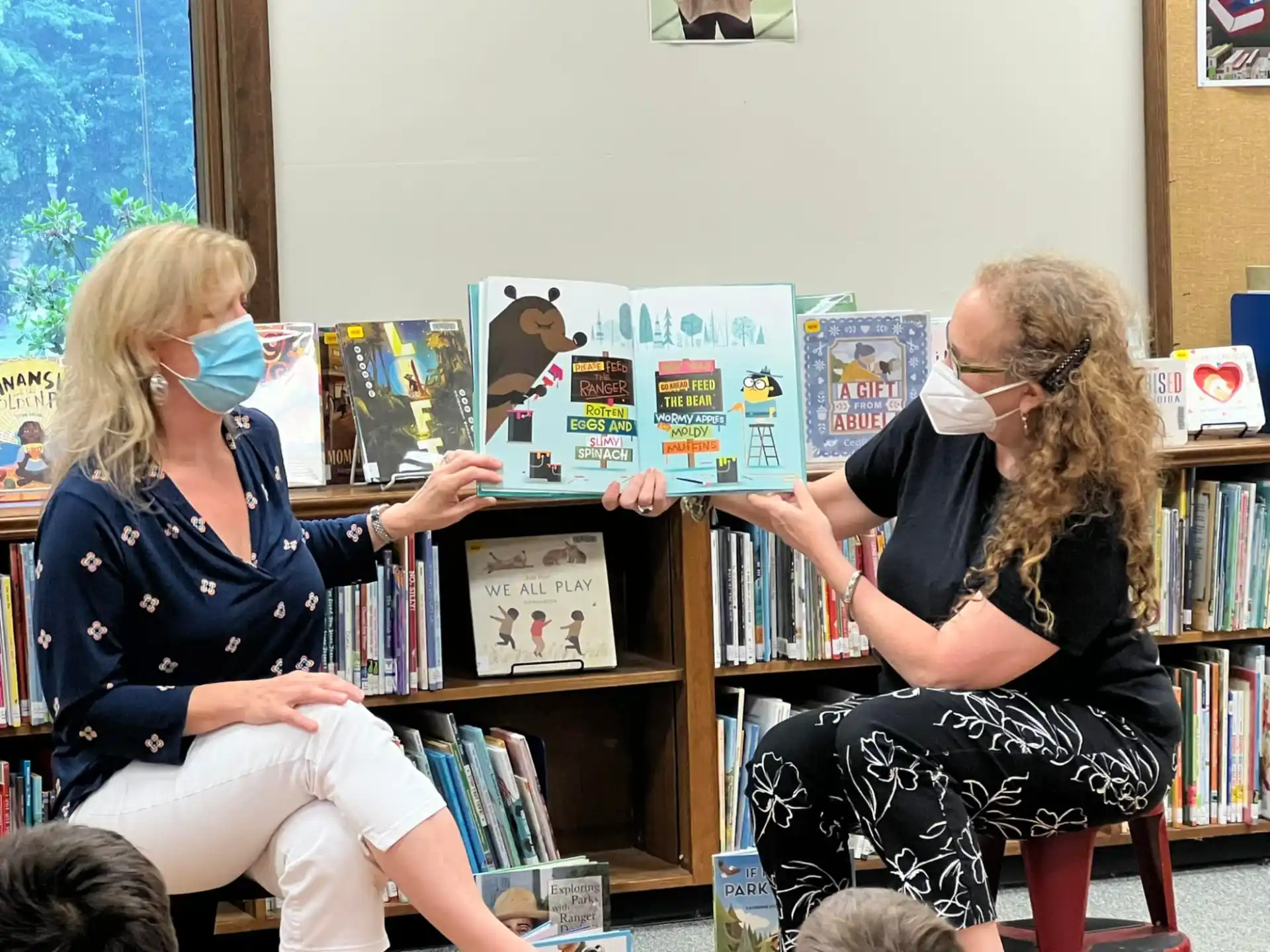 a woman wearing a mask and a woman wearing a mask