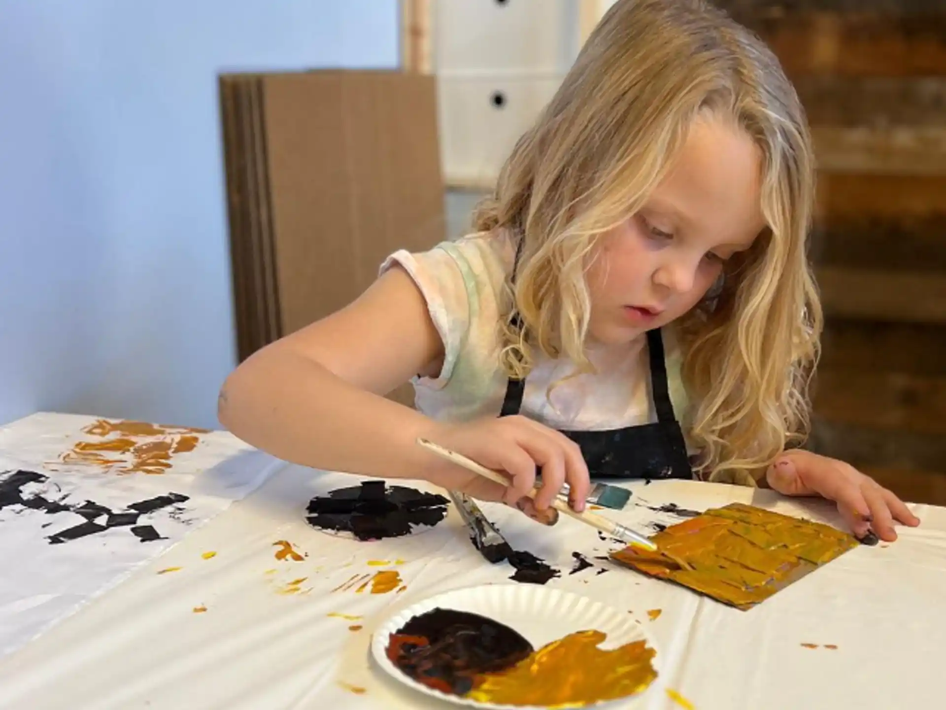 a young girl painting