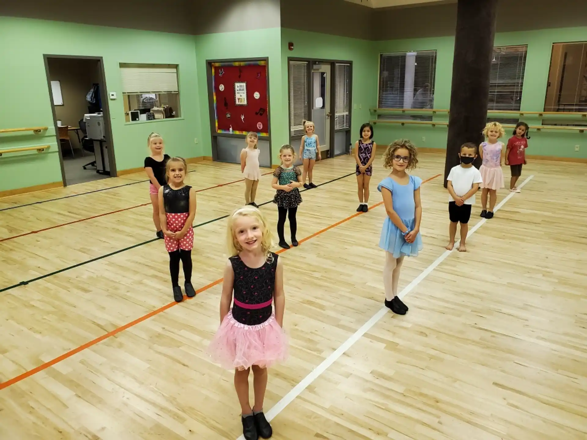 a group of children in a gym