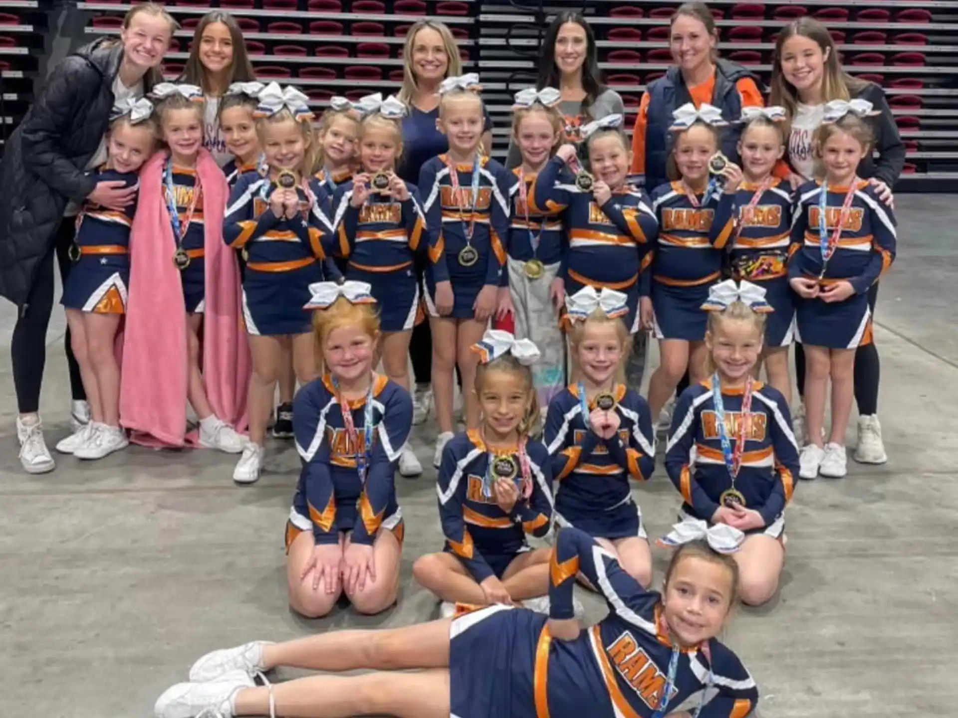 a group of people in sports uniforms