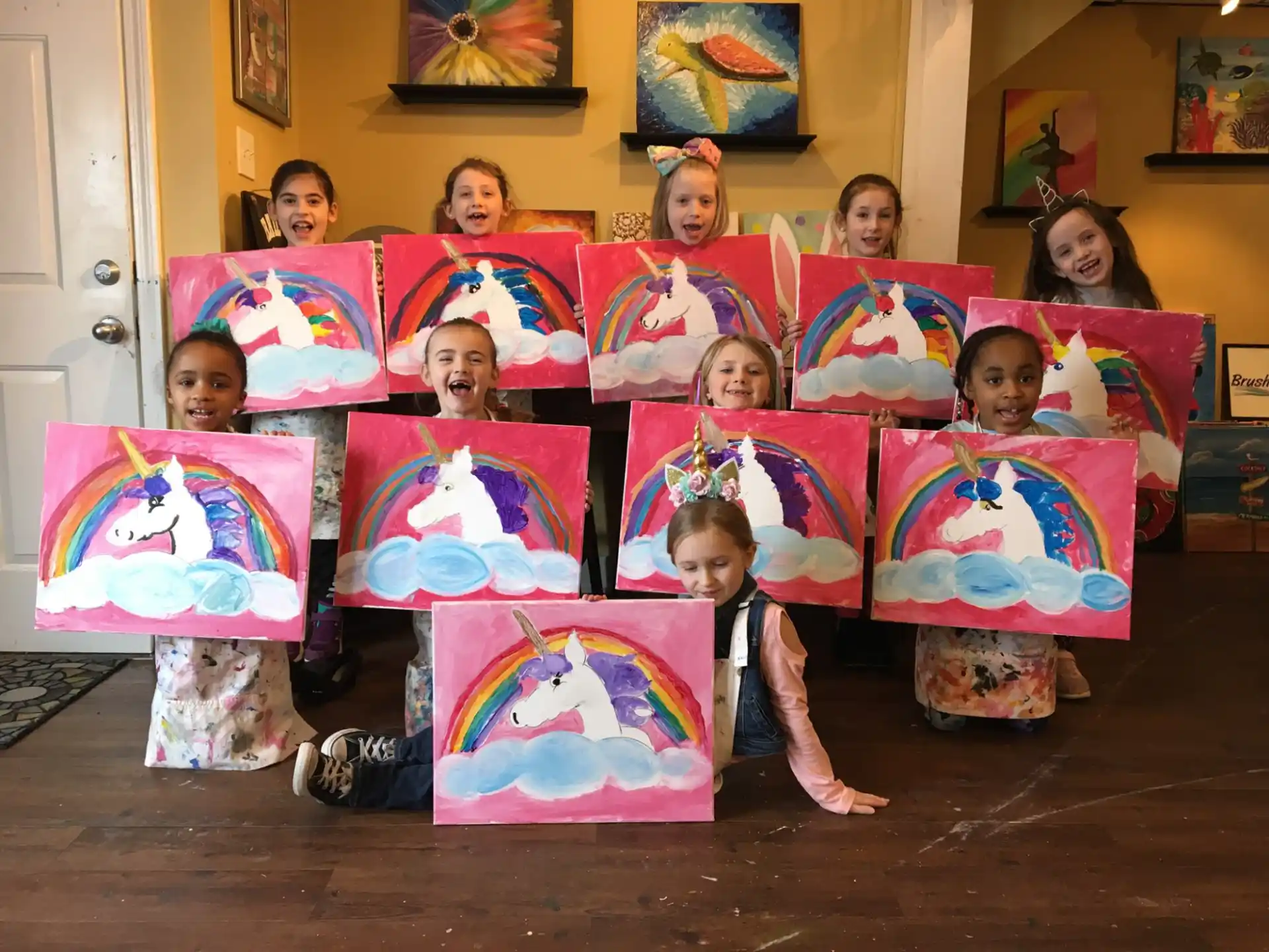 a group of children holding colorful bags